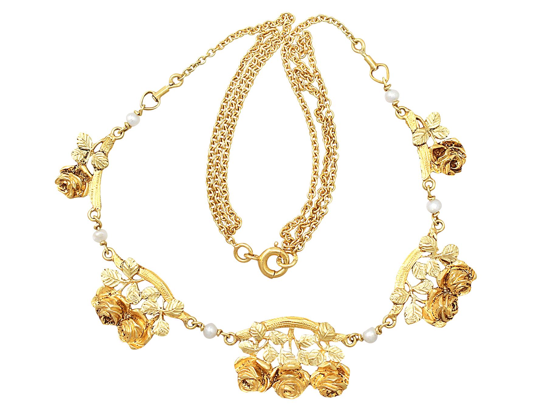 A fine and impressive antique French Art Nouveau style pearl and 18 karat yellow gold necklace; an addition to our antique jewelry and estate jewelry collections.

This fine antique gold and pearl necklace has been crafted in two toned 18k yellow