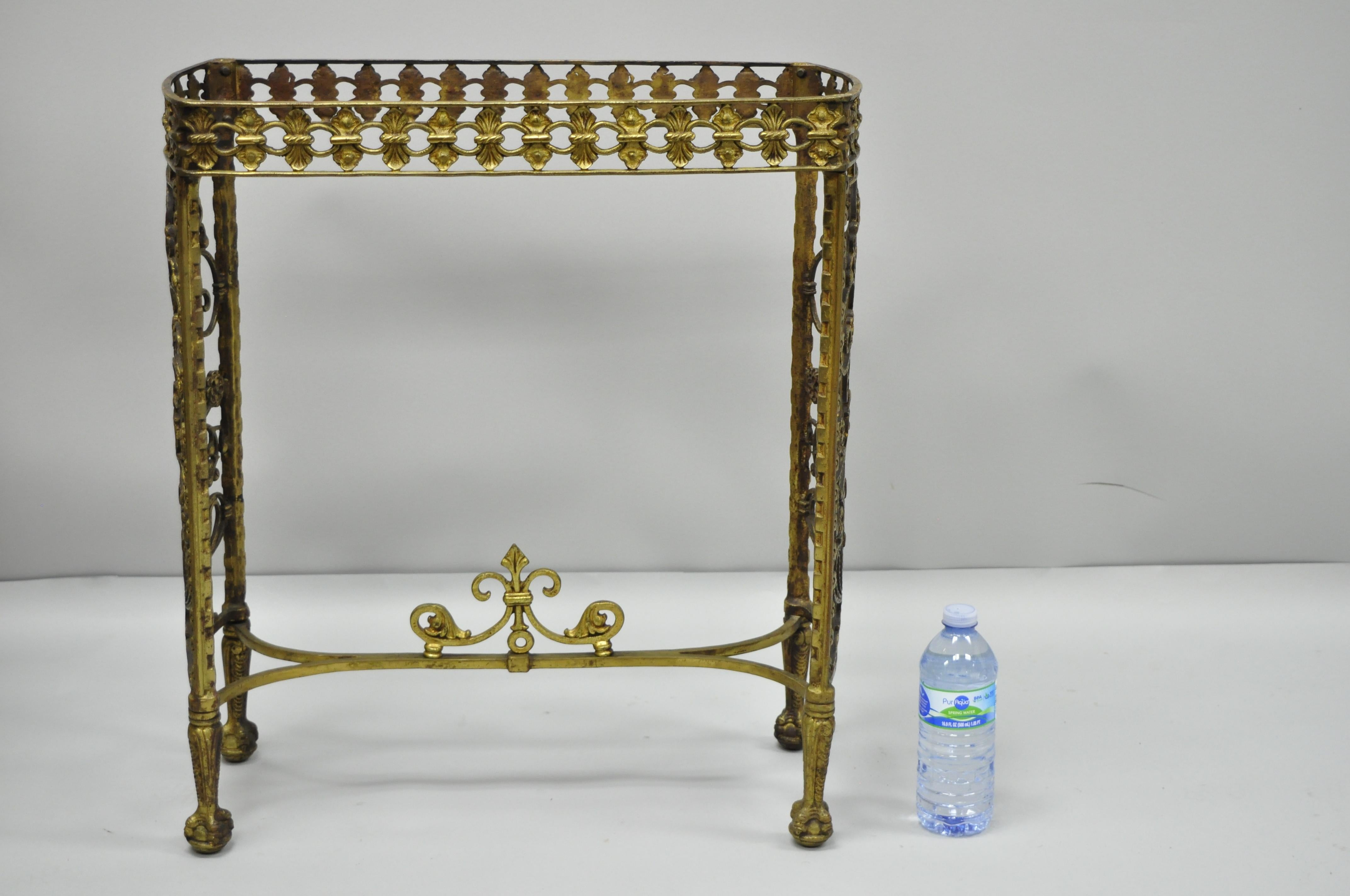 Antique French Art Nouveau/Victorian brass small side table base. Item features ball and claw feet, ornate floral scrollwork, etched floral bouquet and urn pattern to sides, solid brass construction, quality craftsmanship, and great style and form,