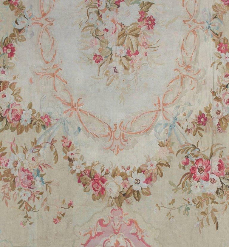 Antique French Aubusson rug 12'7 x 16'2. Situated on the banks of the river Creuse in France Aubusson had been well-known for producing tapestries for centuries. It is claimed that they were weaving in Aubusson as early as the 8th century but it was