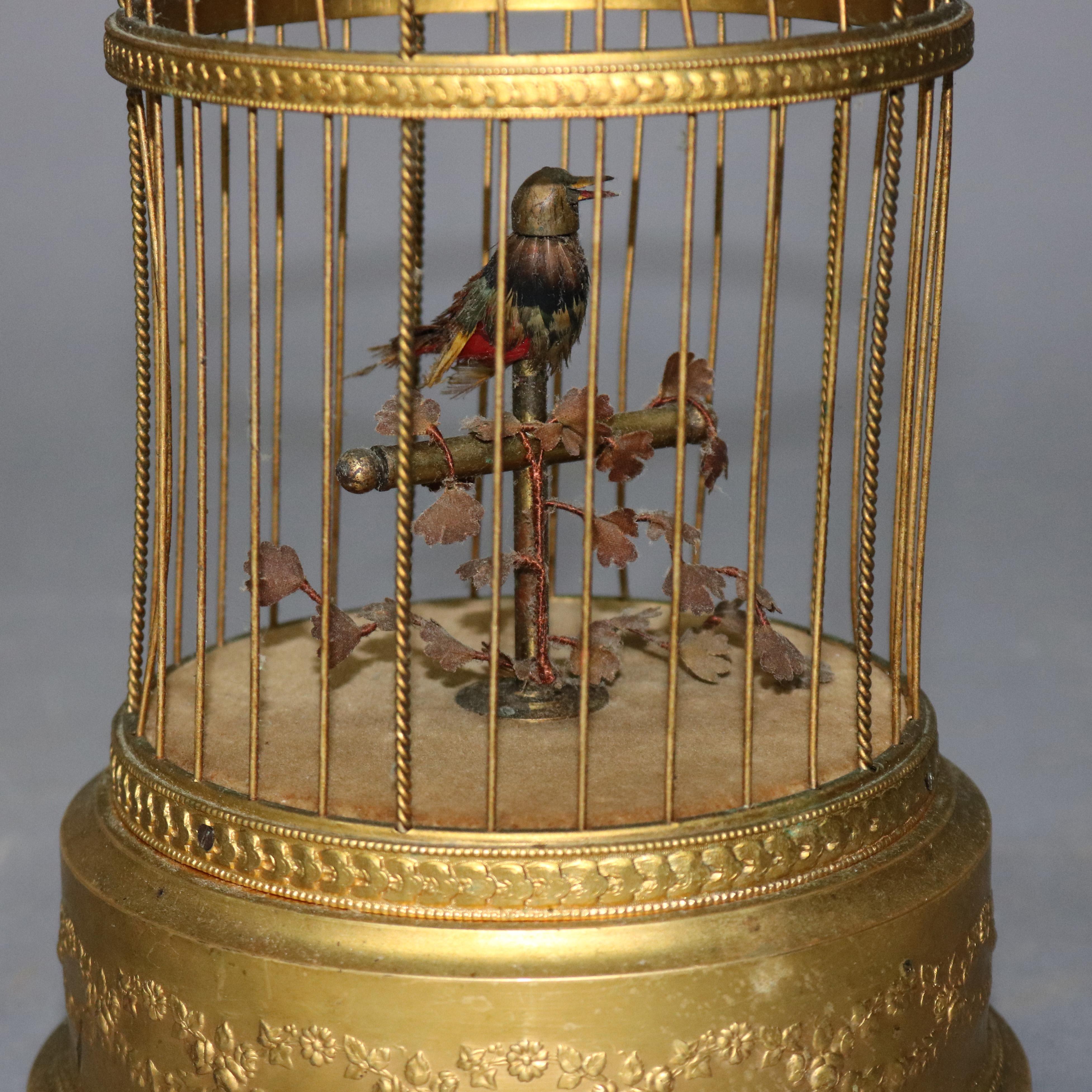 XIXe siècle Automate français ancien:: oiseau chantant dans une cage en laiton:: boîte à musique:: circa 1880