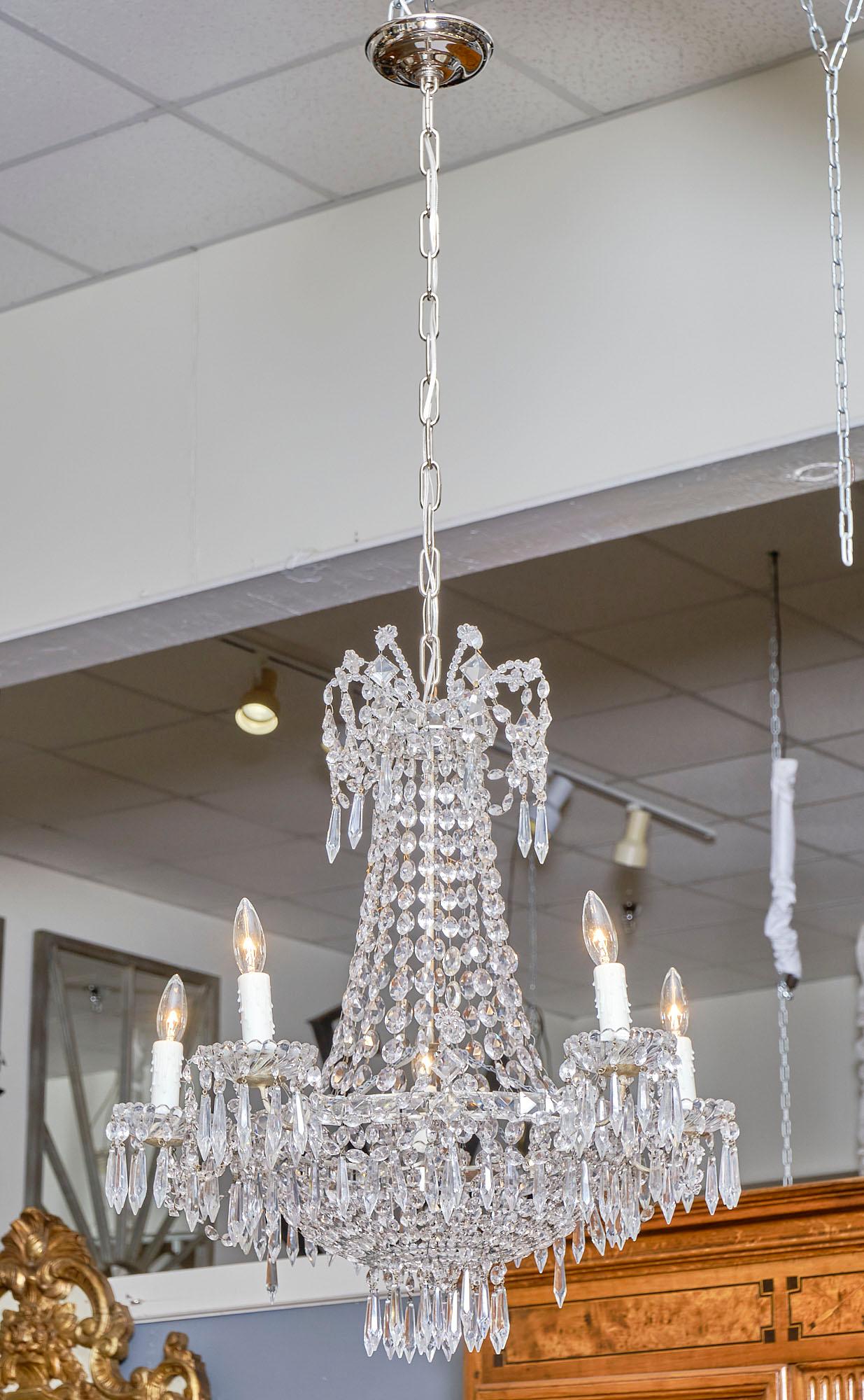 Chandelier from France, “Corbeille” made of cut crystal by Baccarat. This piece has been newly wired to fit US standards.