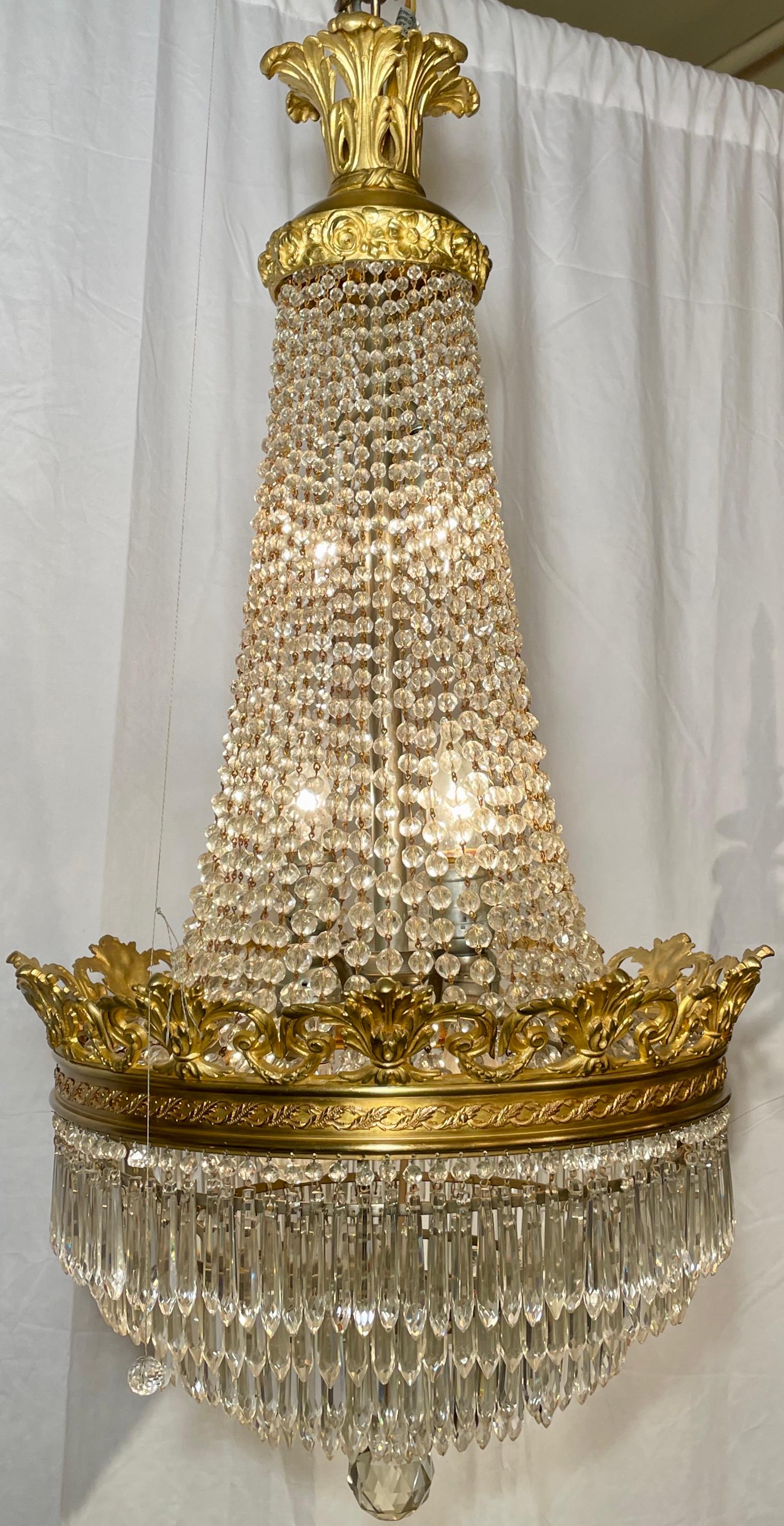 Antique French Richly Draped Baccarat crystal and gold bronze chandelier, Circa 1890s.