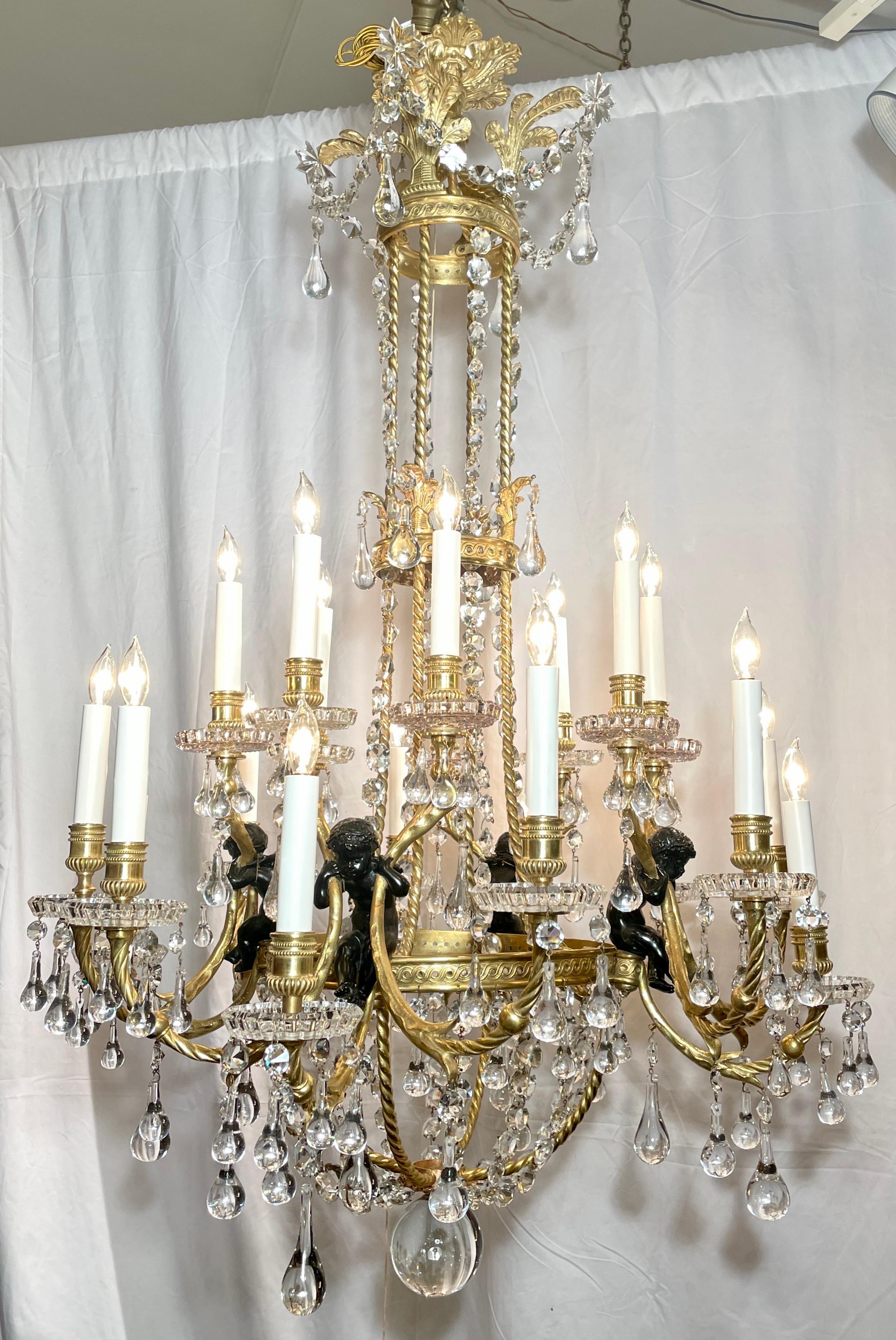 Magnificent antique French baccarat crystal & bronze d'ore chandelier, circa 1890. 
Fine gold & patinated bronze figures & mounts.
