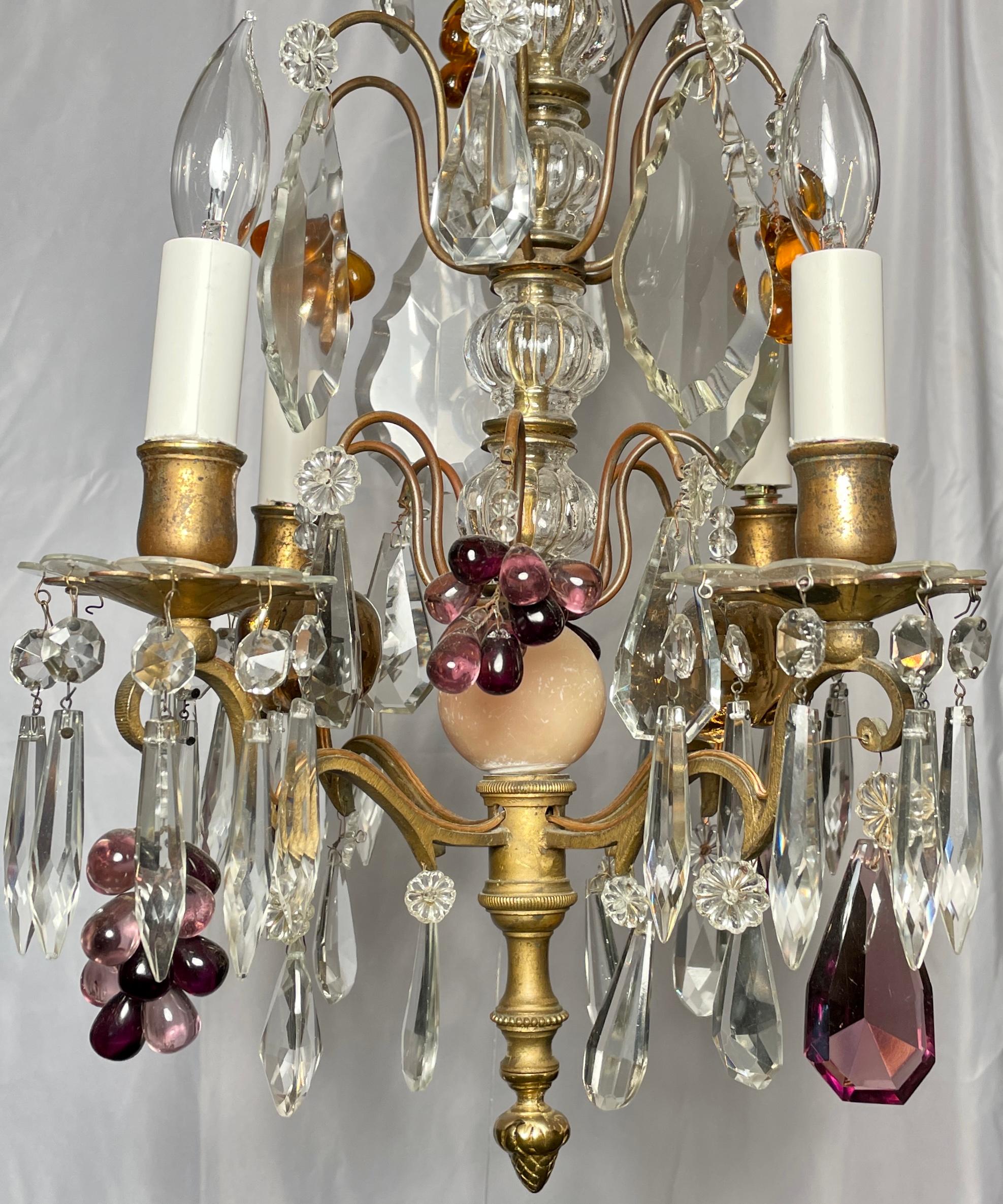 Petite Antique French multi-colored baccarat crystal and gold bronze 4 light chandelier, circa 1900.