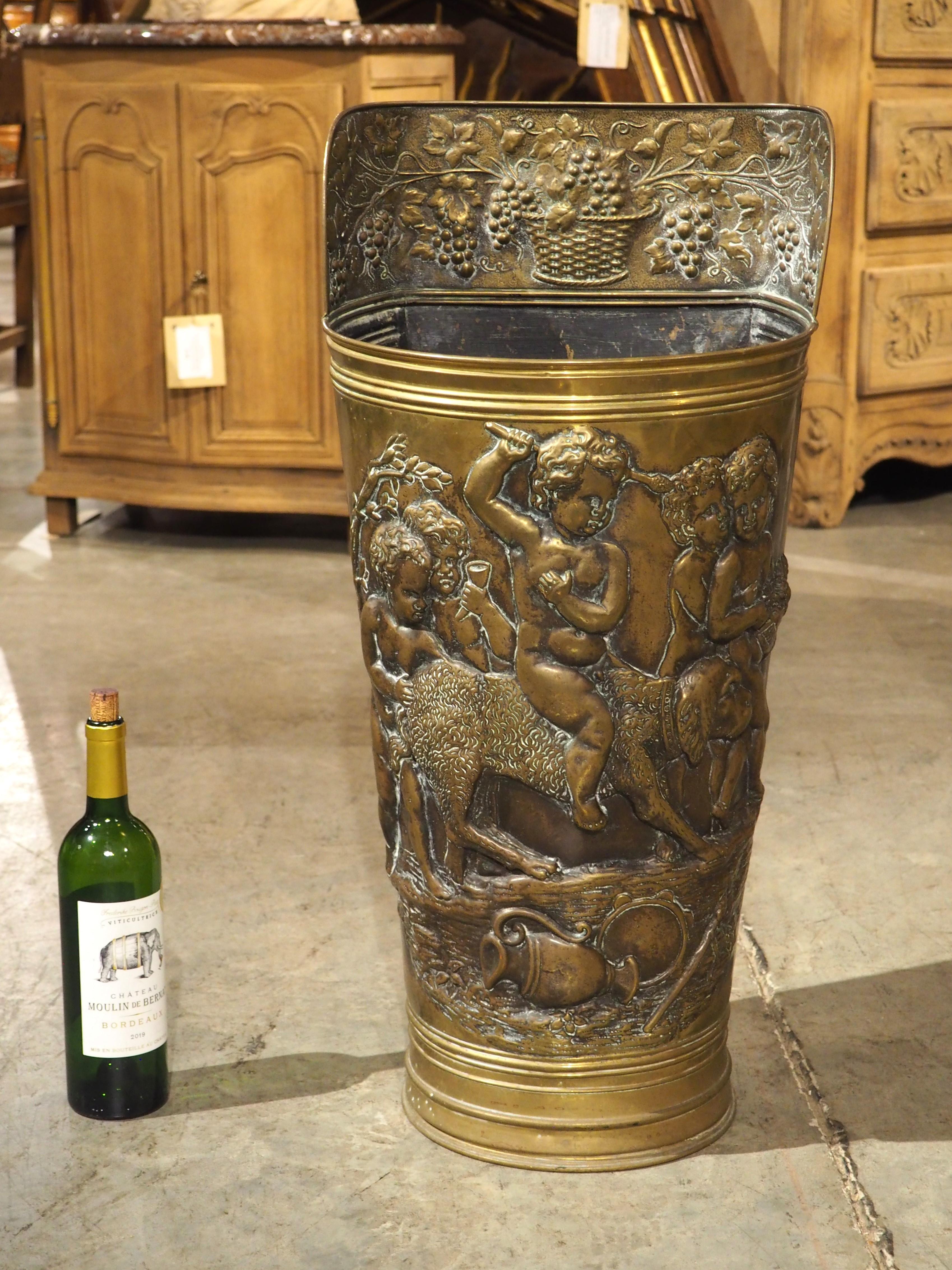 Repousse is a metalworking technique where images are hammered into metal from the inside. The process gives the imagery a raised presence, allowing the artistry to be fully appreciated. In the case of this brass umbrella holder from France, the