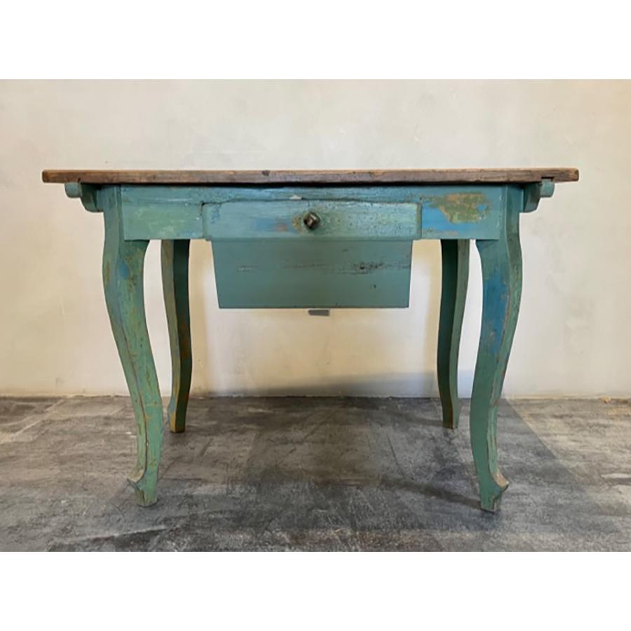 Antique French Baker's Console Table with Drawer

The Antique Baker's Table with Drawer originates from France. The simple, elegant, curved legs, generous drawer and apron are predominantly sea-foam green with previous colors of blue, yellow and