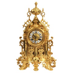 Horloge baroque française d'antiquités en bronze doré