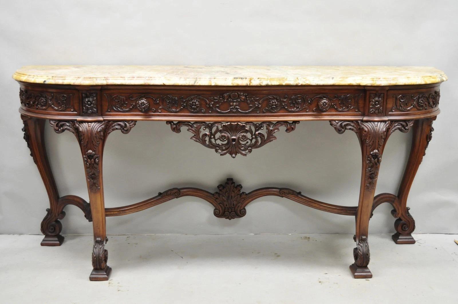 Inviaci un messaggio con il tuo codice postale per richiedere un preventivo per la spedizione negli Stati Uniti.

Antique French Baroque Rococo Style Ornately Carved Walnut Marble Top Long Sideboard Buffet with 3 Drawers. L'articolo presenta una