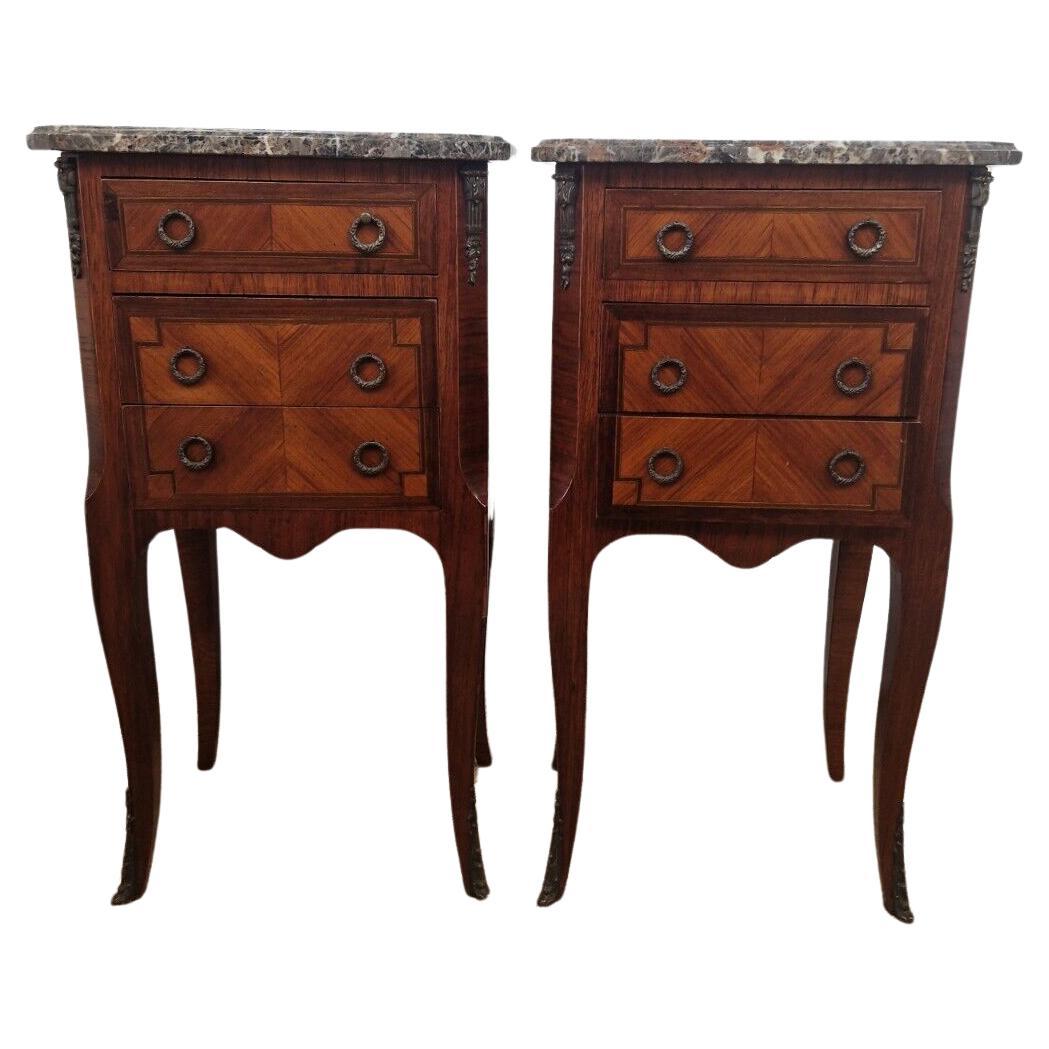 
Pair of Fantastic Transition Style Bedside Cabinets

Sourced in Paris France, Wood Inlays with Bronze Details and Sabots.

2 Drawers for storage and Grey Marble Tops (1 has a professional repair hardly noticeable)

Dimensions

70 High x 38 cm x