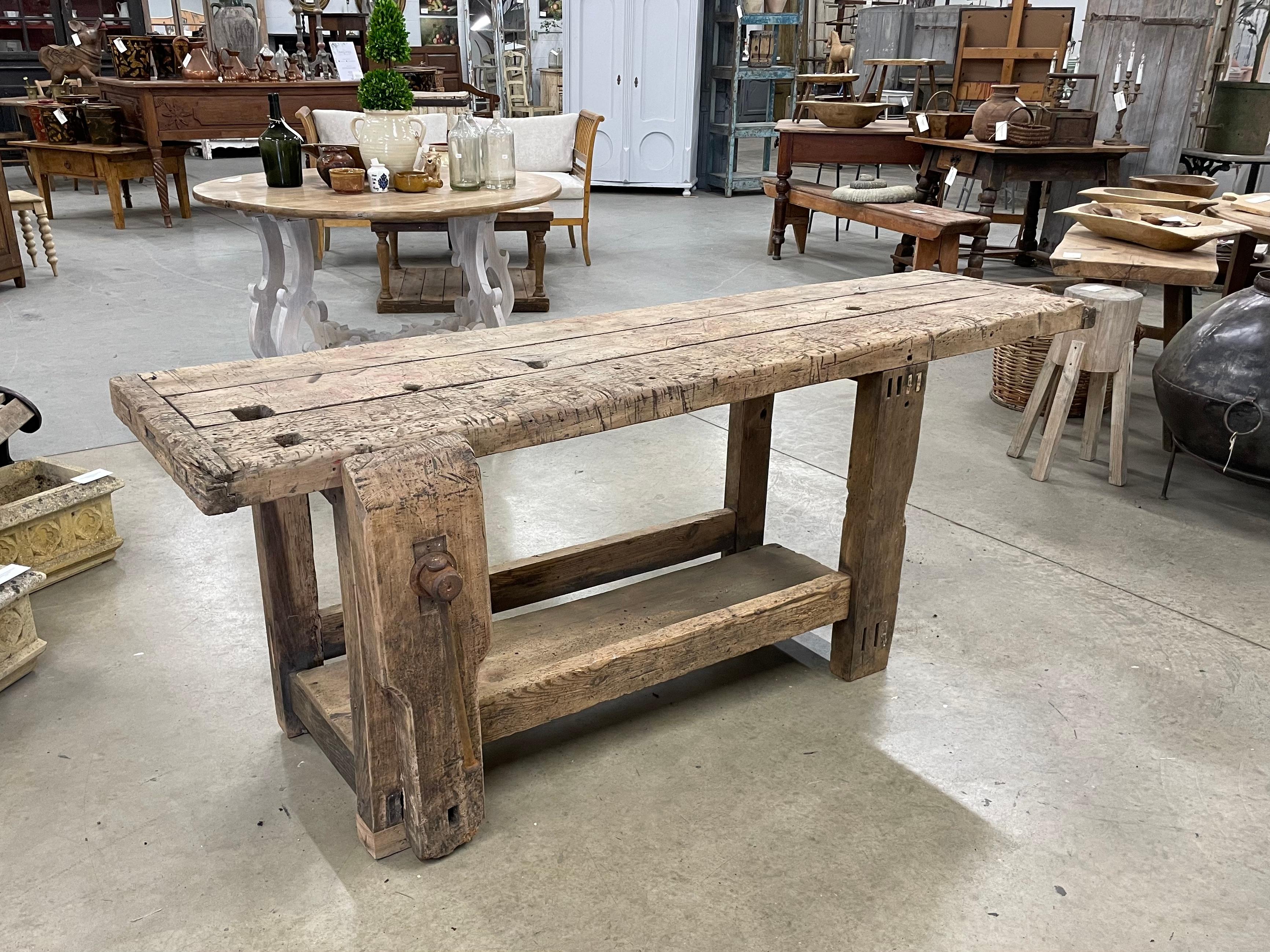 Substantial antique beech wood carpenter’s bench from Burgundy, France. Perfect size and proportions for a console or sofa table. It has its original iron vise and a handy shelf below

Harmony in imperfection is Wabi-sabi - an ancient Japanese ethos