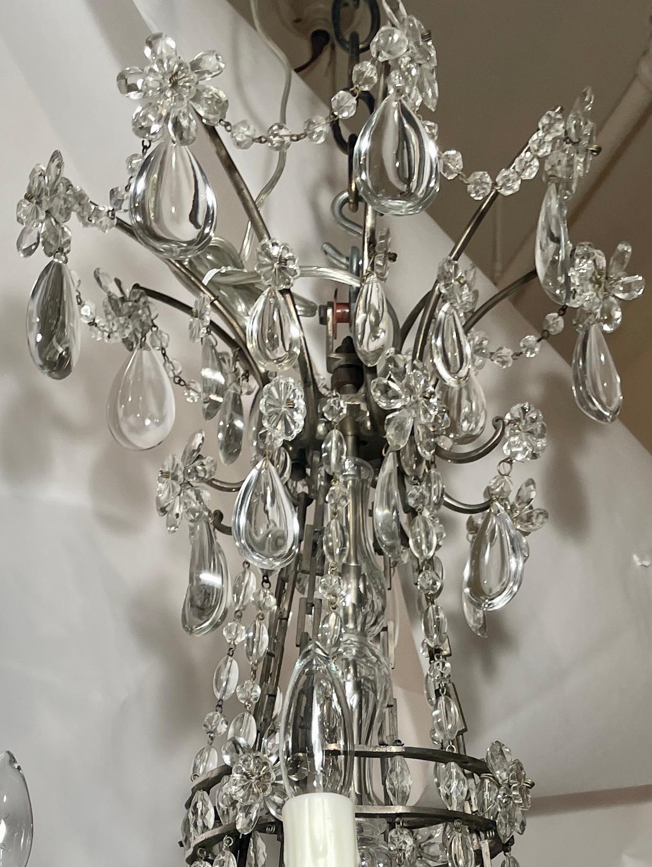 Antique French Belle Époque silver on bronze fine crystal 8-light chandelier.