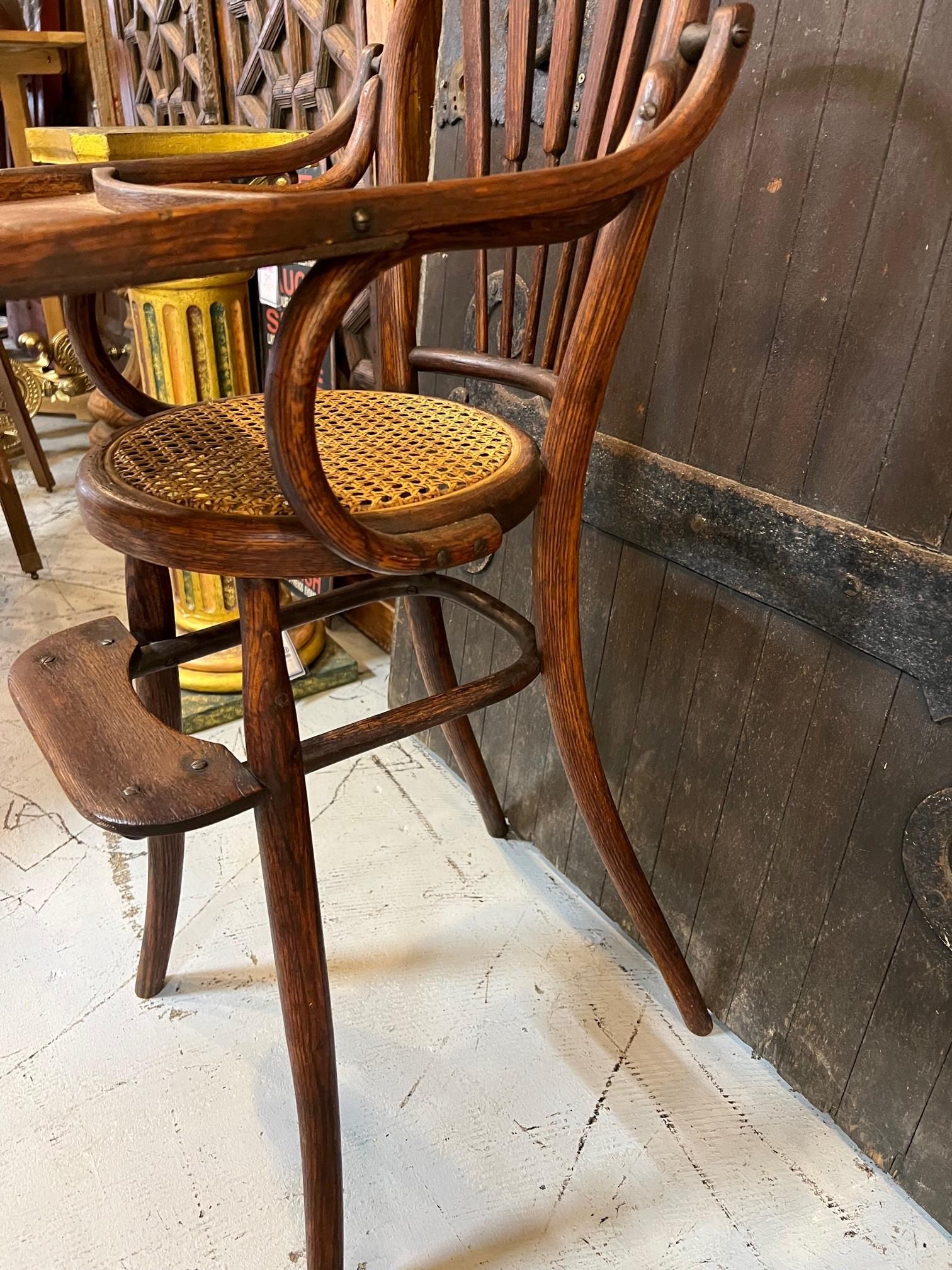 20th Century Antique French Bentwood Hand Crafted Baby's High Chair with Round Cane Seat