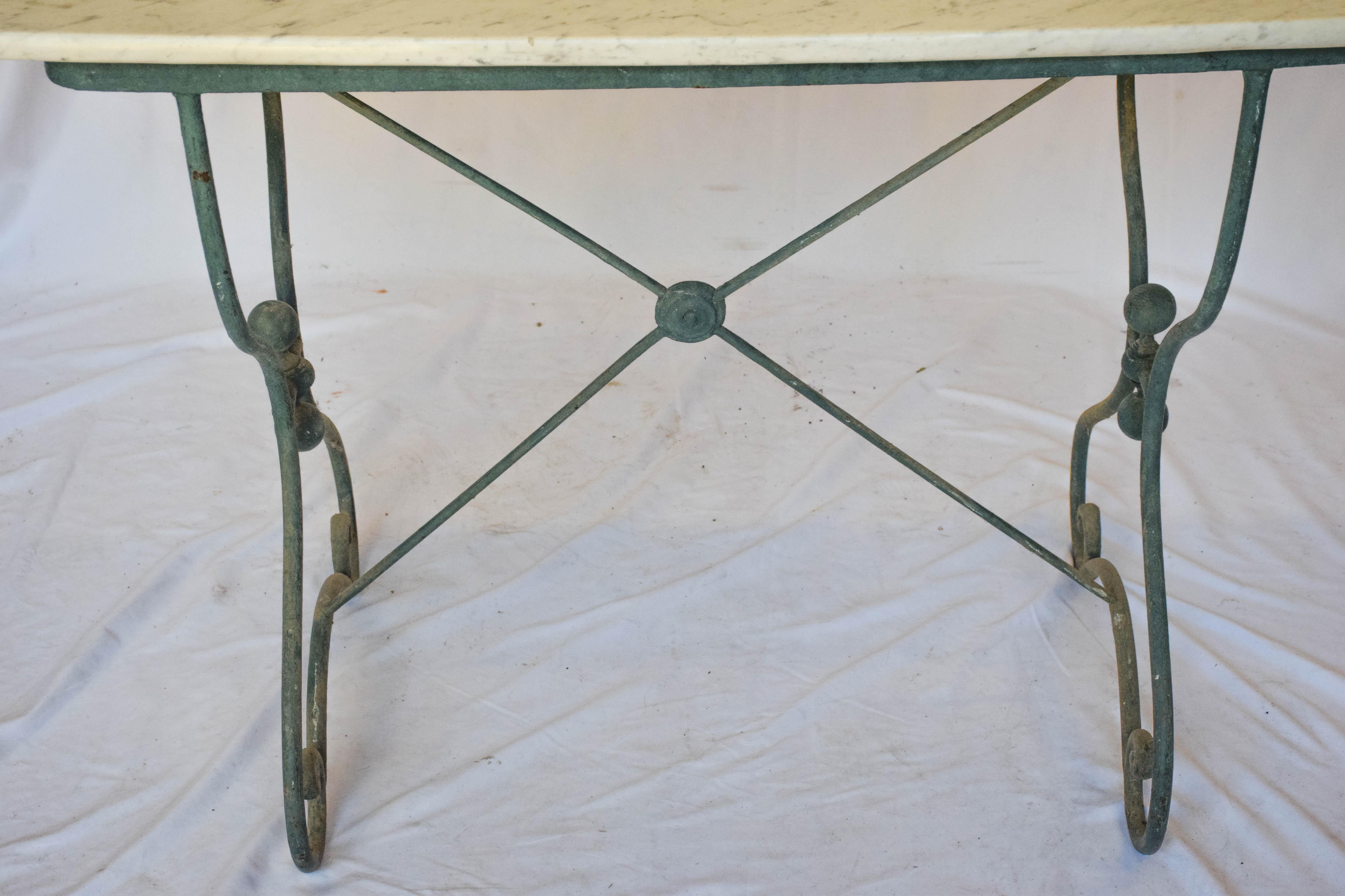 Early 20th century French Bistro table with marble top. This table has a very nice patina and would work well indoors or out. Could be charming used as a small breakfast table or in a powder back with a sink installed on top.

20