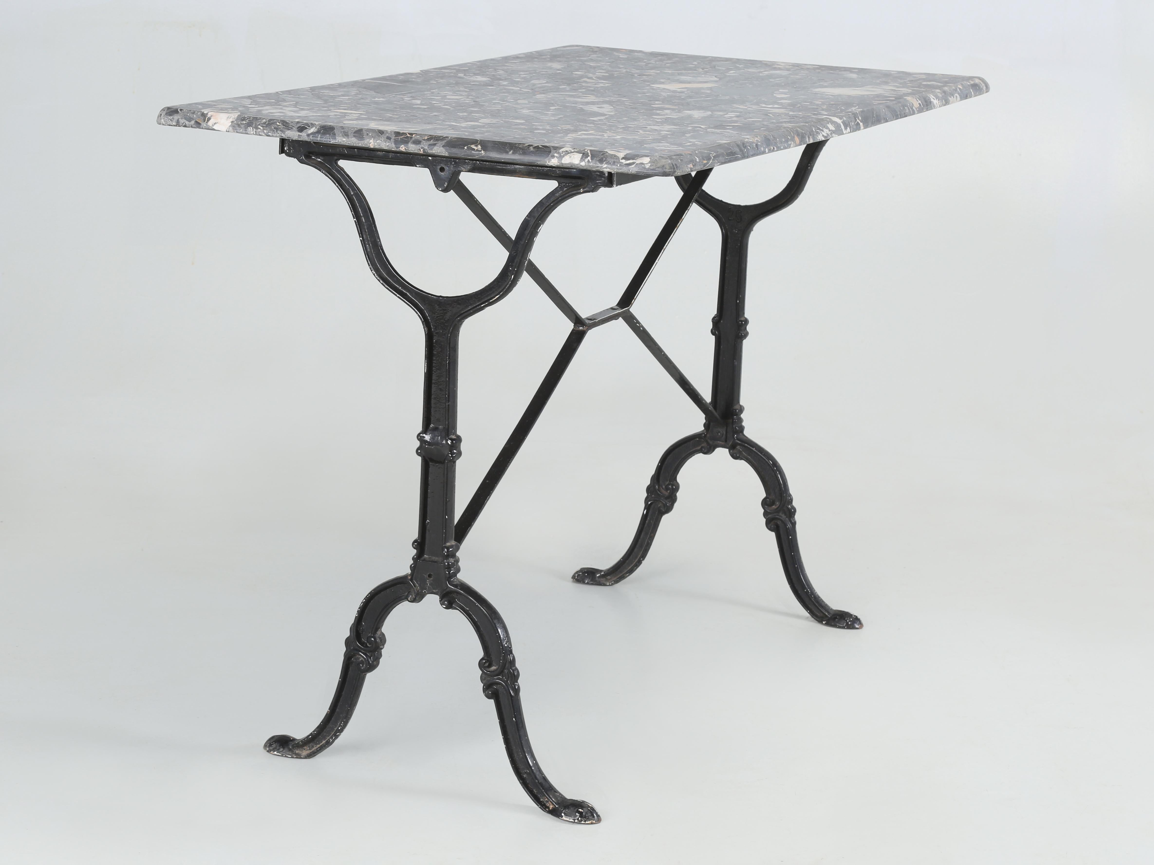 Antique French Bistro Table or Gueridon with Cast Iron Base and Marble Top. The French made these Bistro Tables for decades without ever changing the style for they proved to be just as comfortable placed inside the home or outside in the garden.