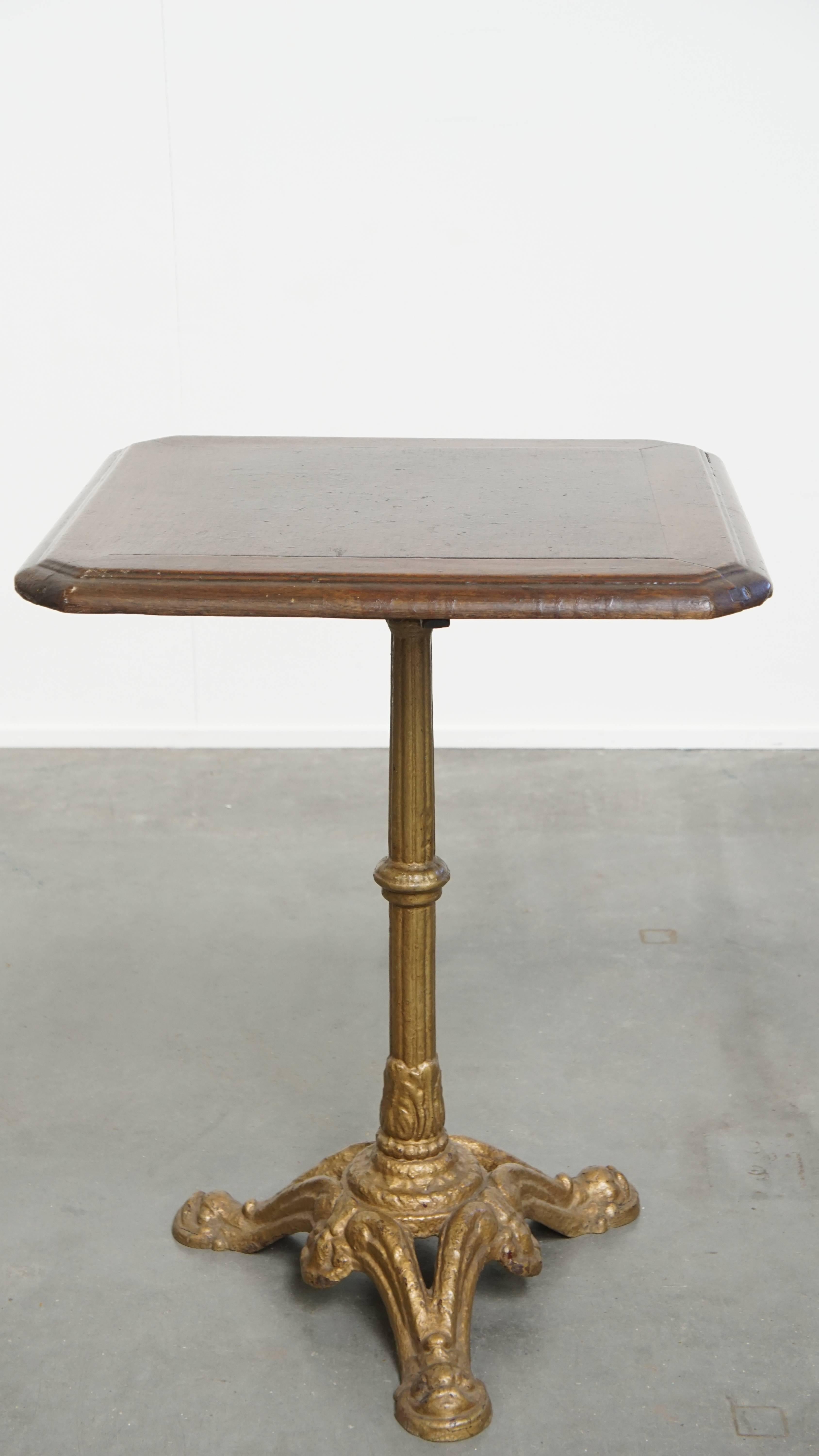 Antique French Bistro Table with Gold-Colored Cast Iron Base and Dark Oak Top In Fair Condition For Sale In Harderwijk, NL