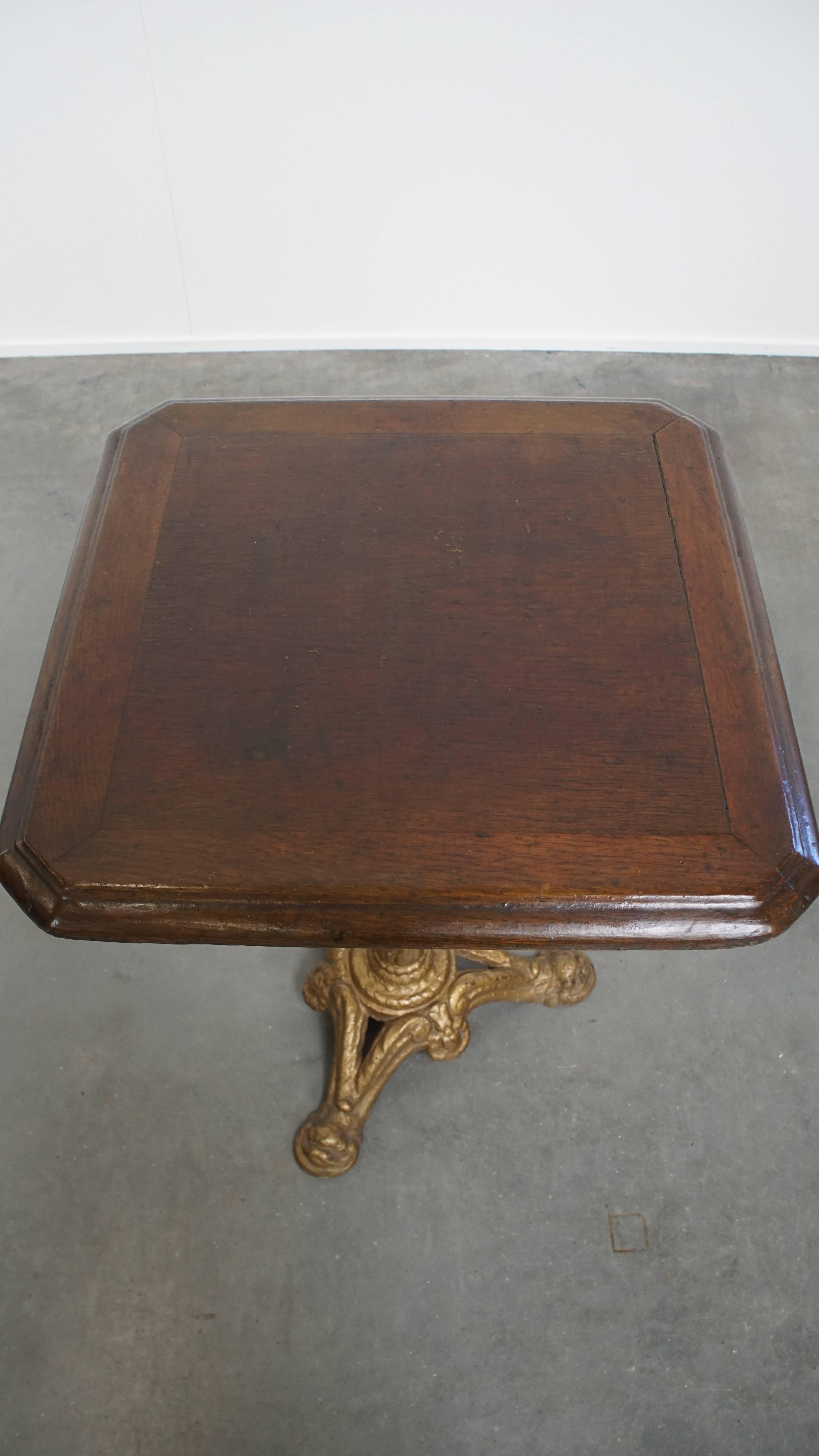 Antique French Bistro Table with Gold-Colored Cast Iron Base and Dark Oak Top For Sale 1