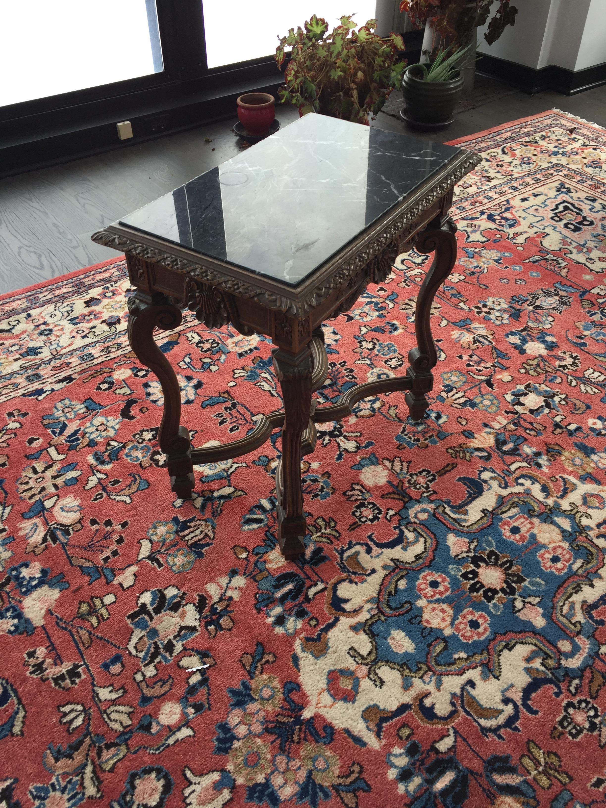 Antique French black marble side or end table
Incredible turned out legs
Beautifully veined black marble.
 
