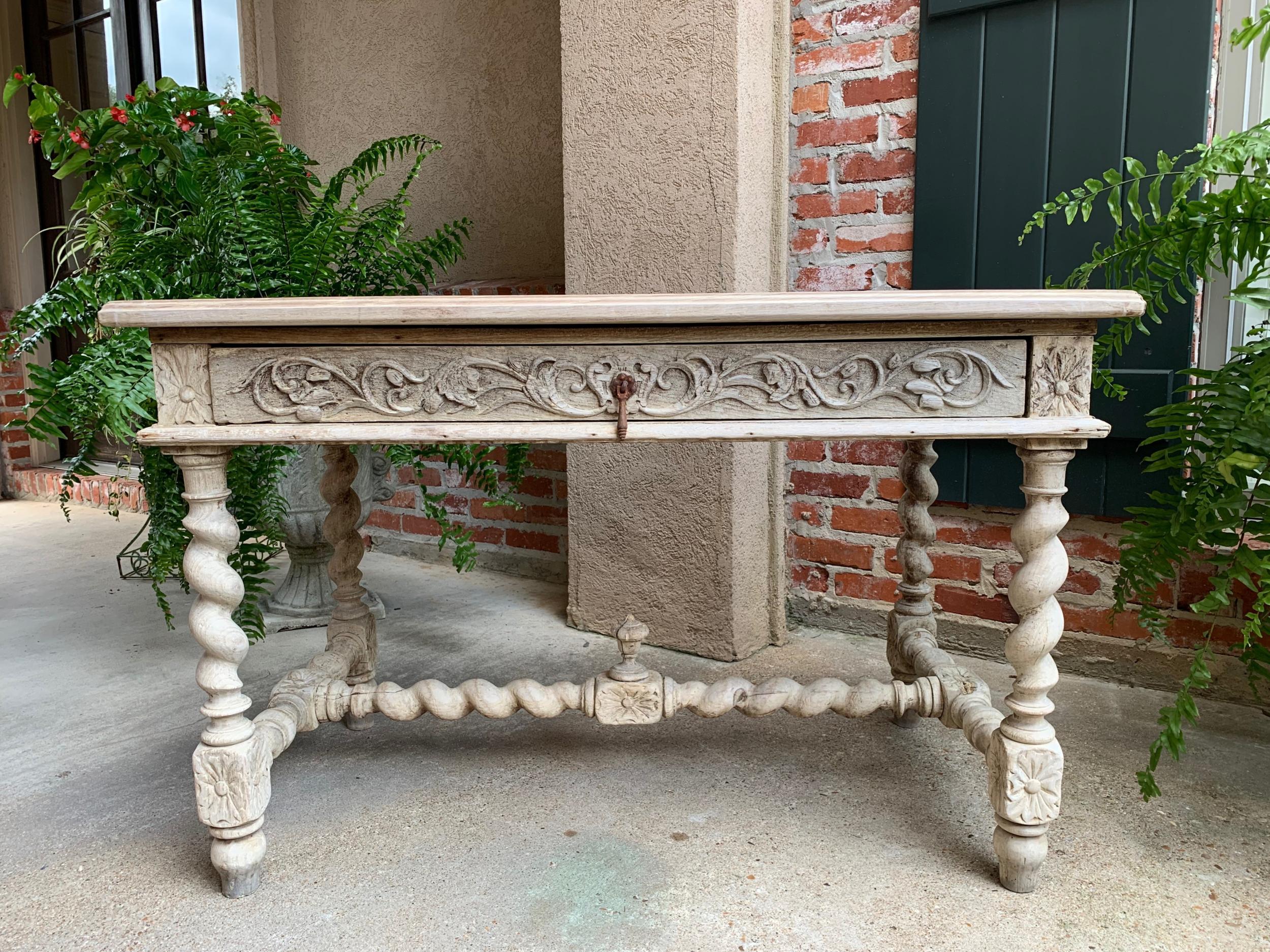 Antique French bleached carved oak sofa table desk barley twist Louis XIII 

~Direct from France~
~Lovely antique French writing desk or sofa table with generous carvings, and a stripped finish.~
~Front frieze features large drawer with carved