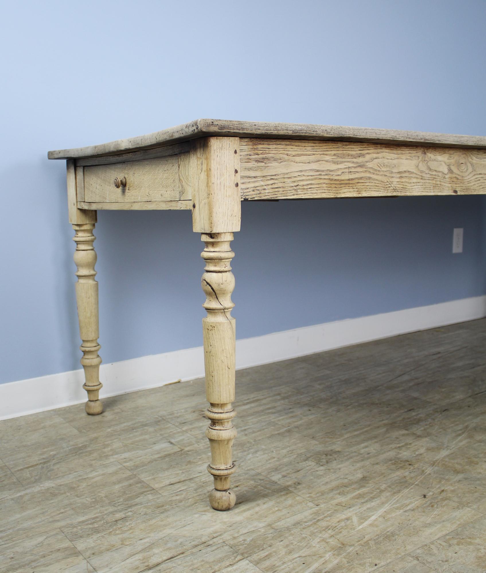 Antique French Bleached Oak Farm Table with Turned Legs and Two Drawers 6