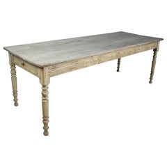 Antique French Bleached Oak Farm Table with Turned Legs and Two Drawers