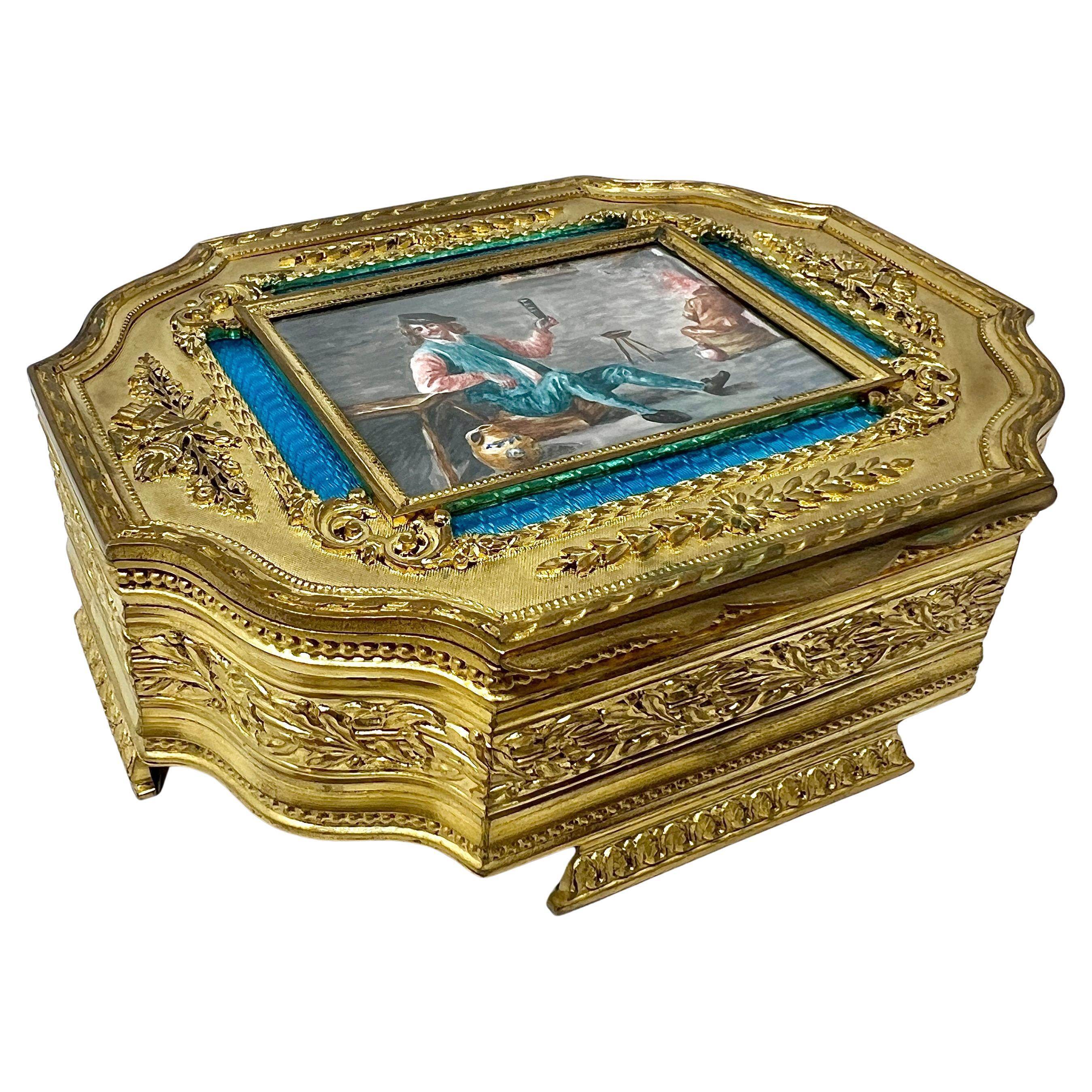 Ancienne boîte à bijoux française en porcelaine émaillée bleue et bronze doré, vers 1910.