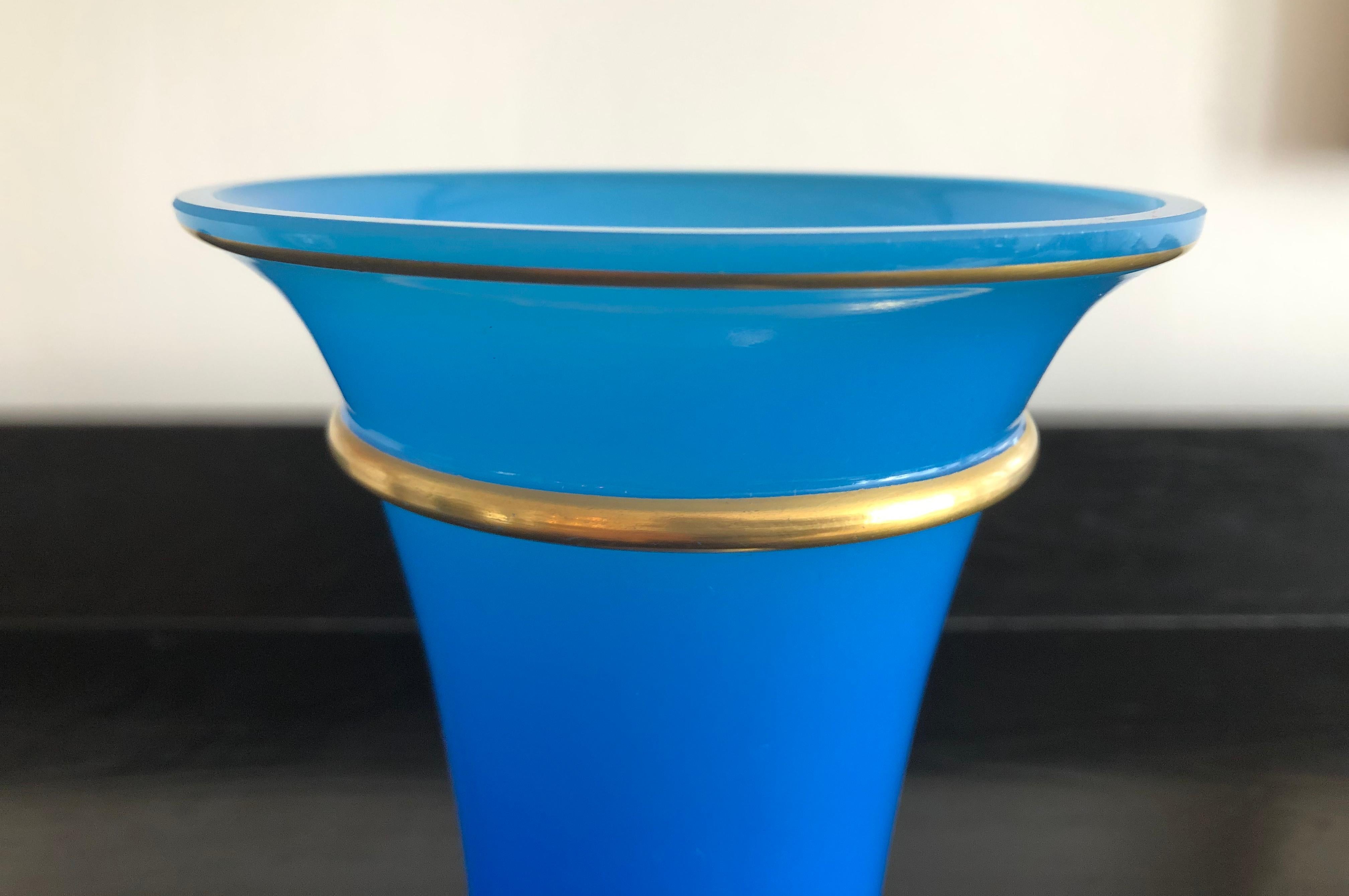 An antique French blue opaline glass vase of cylindrical form with flared rim with gilded striped band decoration. Rich, vibrant blue color and good weight. Excellent condition. 