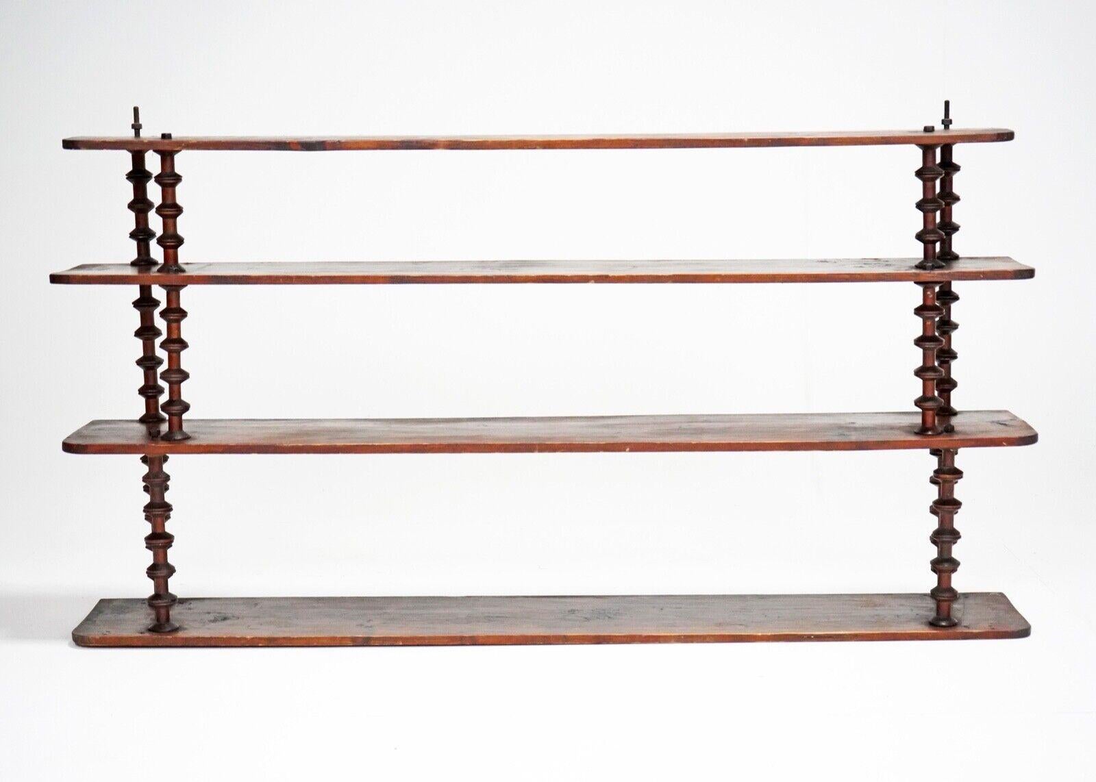 French shelving unit made from bobbin reels. 
Dating from the 1900s. 
This is a exceptionally large four tier shelving unit. 
Its been cleaned and had a wax applied that's bought out the beautiful colour of the wood.

Dimensions

Height -