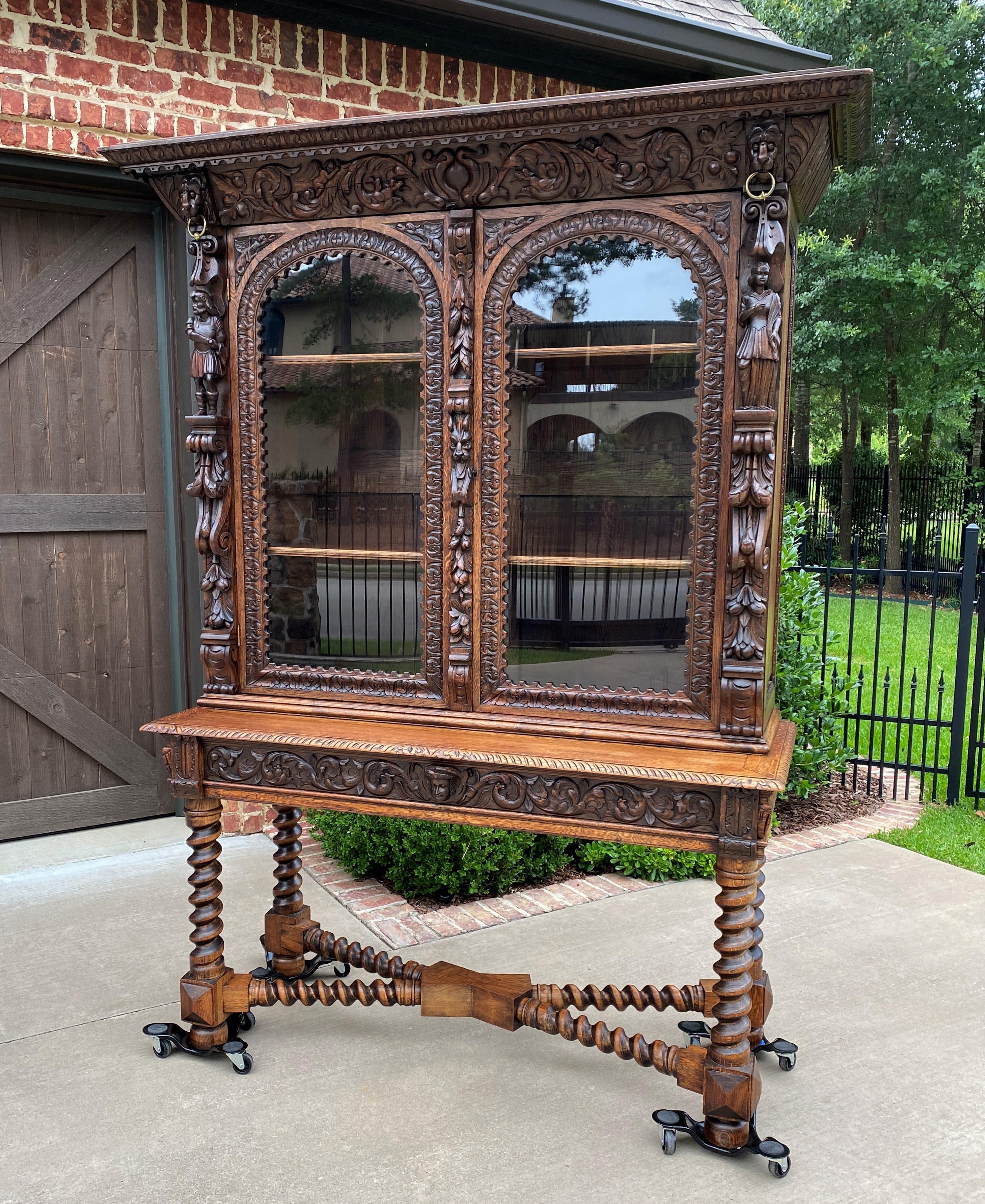 Exceptional 19th century antique french oak renaissance bookcase or display cabinet on barley twist stand~~
 c. 1880s 

 This is only one of multiple exquisite pieces recently received from our European shipper~~wonderful hand-carved oak pieces