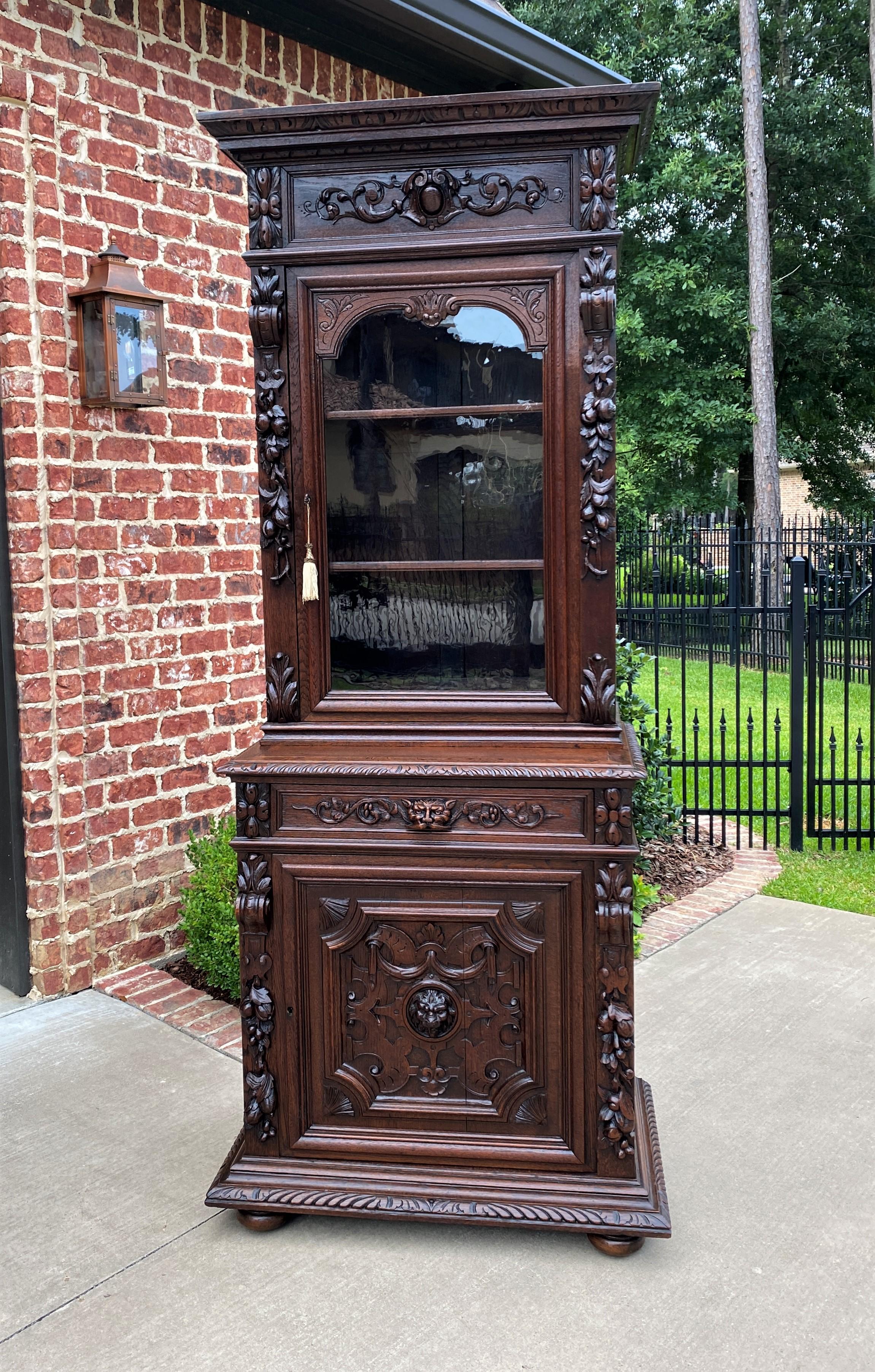 Antique French Bookcase Hunt Cabinet Dark Oak Black Forest Renaissance 19th C In Good Condition In Tyler, TX