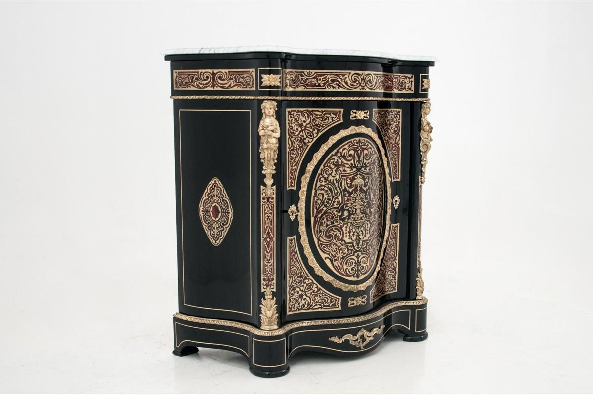 After restoration 19th century French Boulle serpentine fronted cabinet with shaped glazed doors , marble top and shelfs inside. The door decorated with brass / tortoishell inlay and a classical figure in the middle of the raised oval panel, gilded