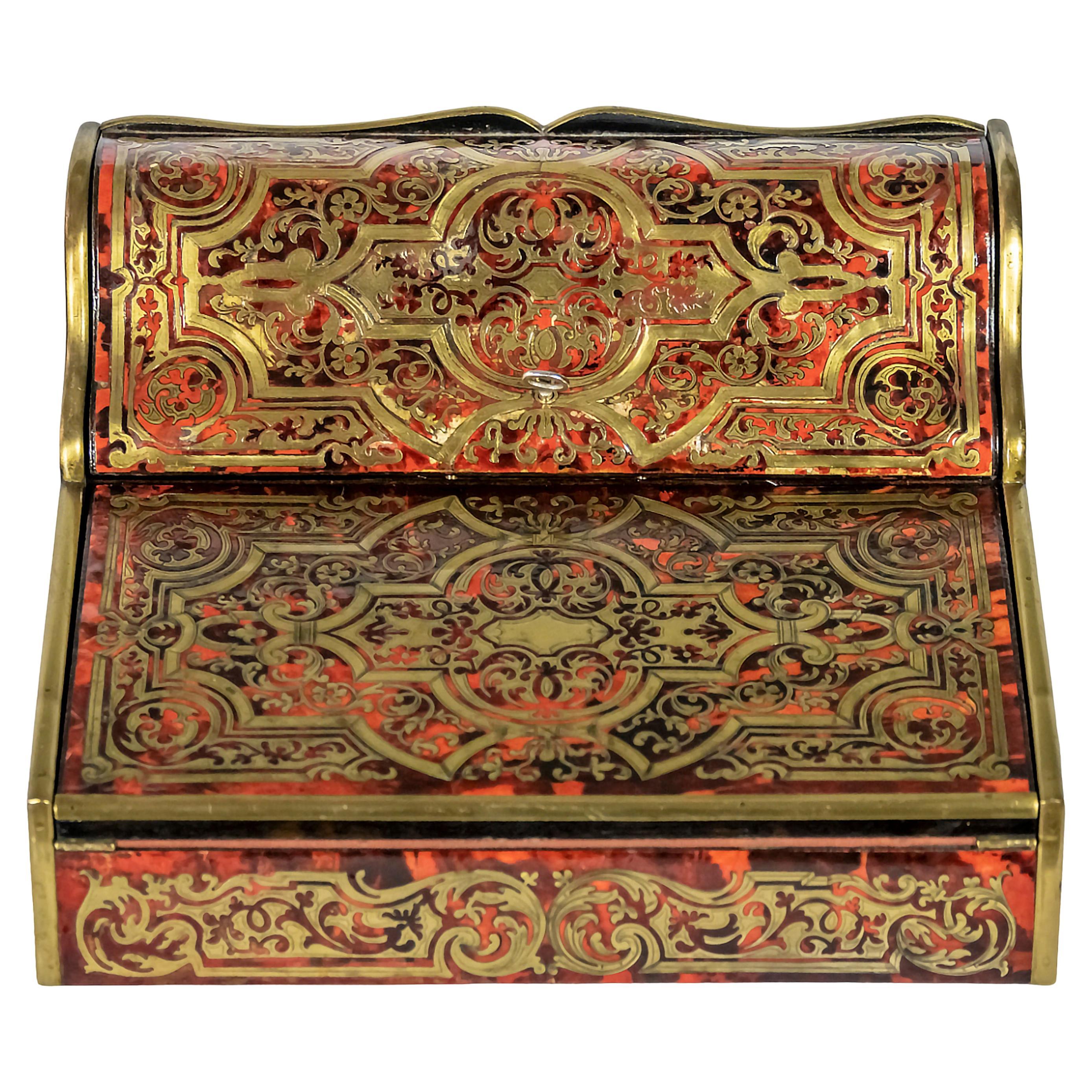 Antique 19th century French Boulle Napoleon III marquetry with inlaid brass writing desk/table box.
Inside there is mail compartment, velvet textile, one inkwell place.
Key with perfectly functional lock.
Very good antique condition.
 
