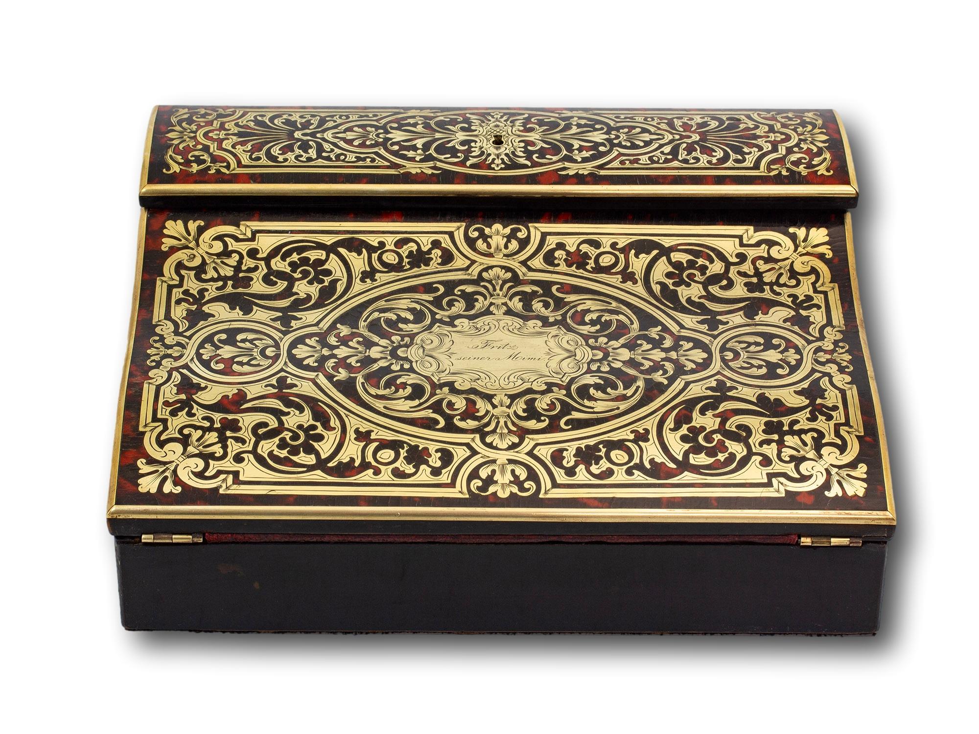 Edged In Brass

From our Writing Box collection, we are pleased to offer this French Boulle Writing Box. The Writing Box of small form having a square shaped body veneered in ebonised pear wood with a sloped lid inlaid with fine scrolling boulle