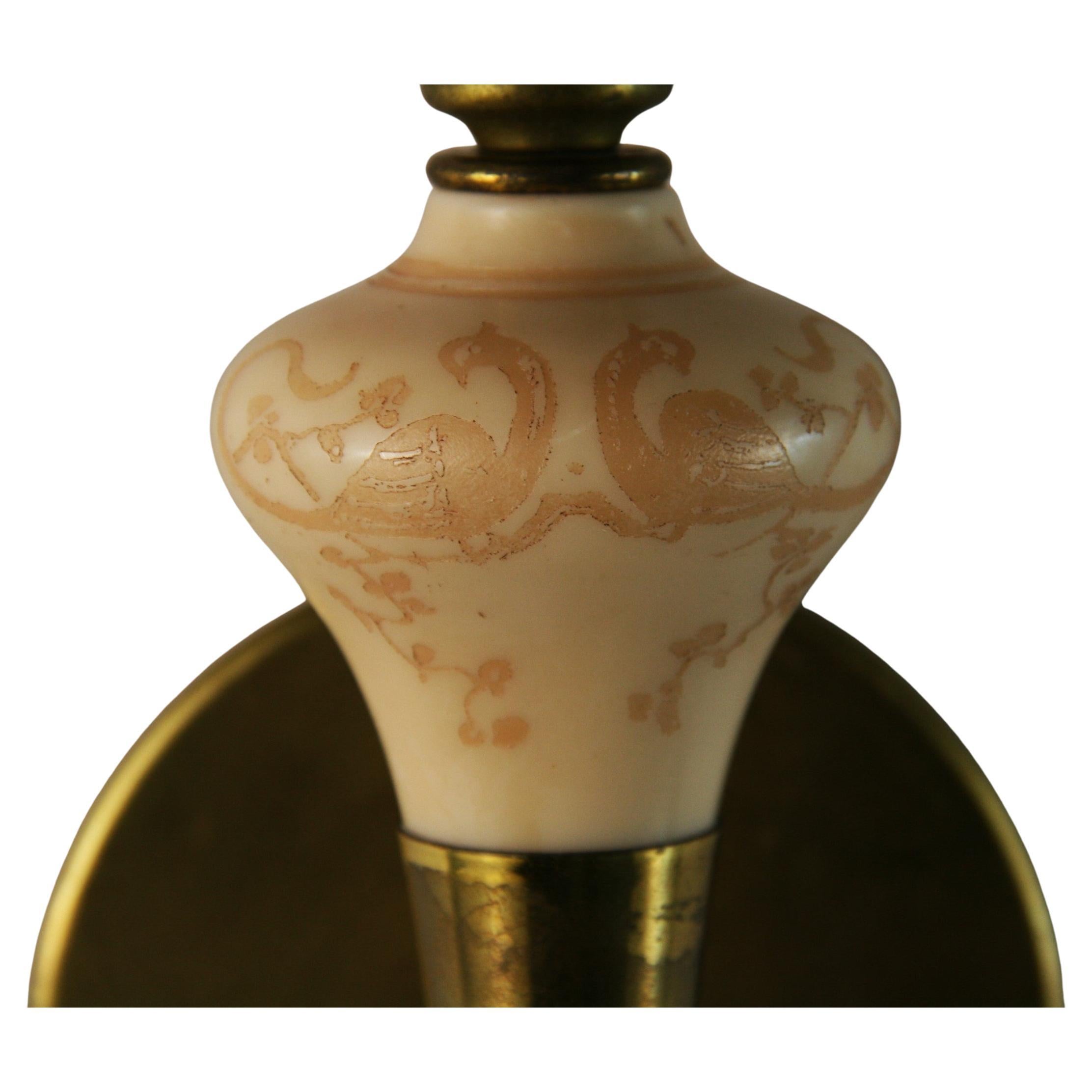 1586  A pair of French Daum acid etched glass and brass sconces
Etched birds and foliate details
Takes one 60 watt candelabra based bulb
Newly rewired.