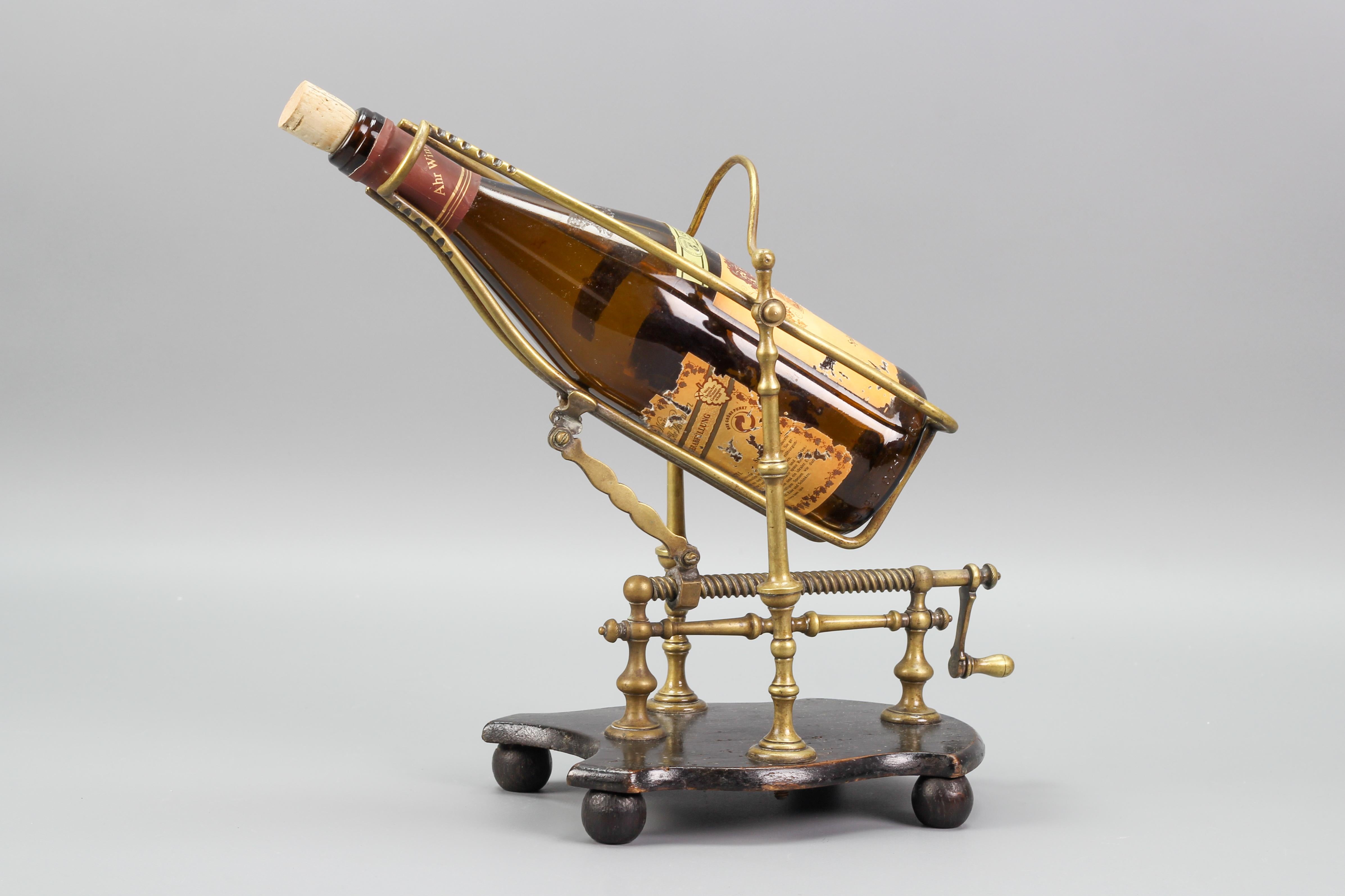 Restauration Antique French Brass Bottle Holder Pourer Cradle in Wood Stand For Sale