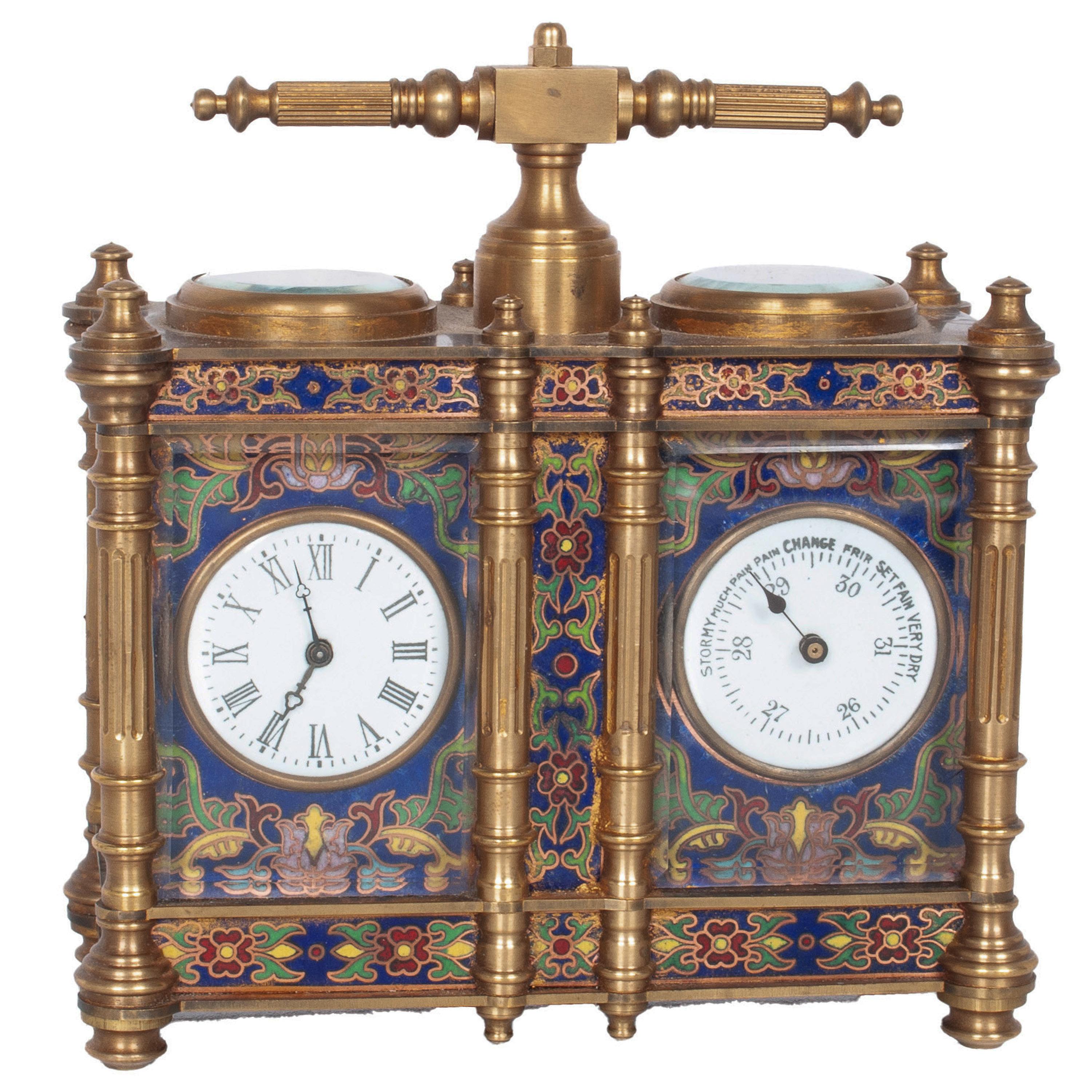 A good antique French brass & champleve combination eight day carriage clock and barometer desk set, France, circa 1900.

Twin dials in cream porcelain with black markings, the time dial with Roman numerals and the barometer with Arabic numerals,