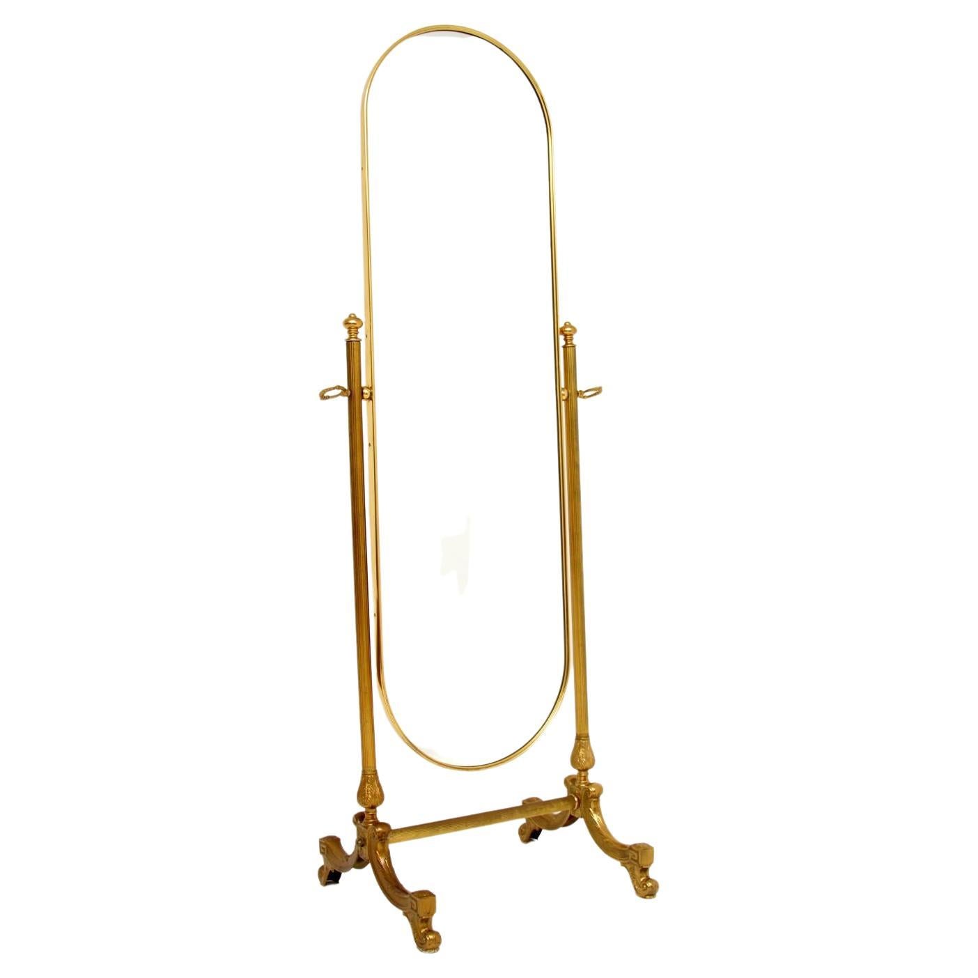 A beautiful and useful antique French cheval mirror in solid brass. This was made in France, it dates from around the 1950’s.

It is very well made and of amazing quality. The oval mirror can be tilted to different angles, this has wonderful