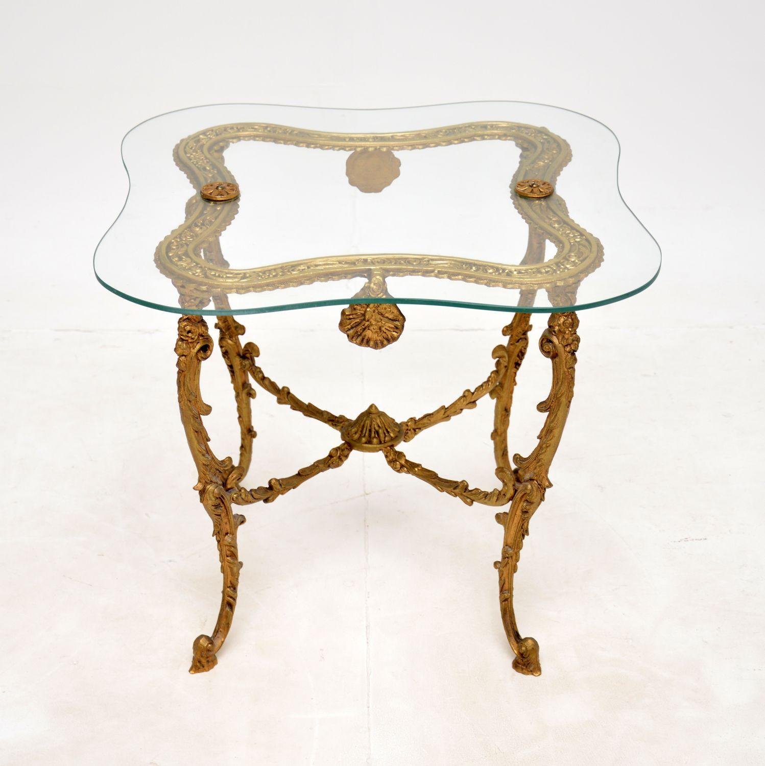 A stunning antique French low table with a brass frame and fixed glass top. This was made in France, it dates from around the 1930’s period.

It is of excellent quality and is beautifully designed. It is a perfect size to be used as a coffee table