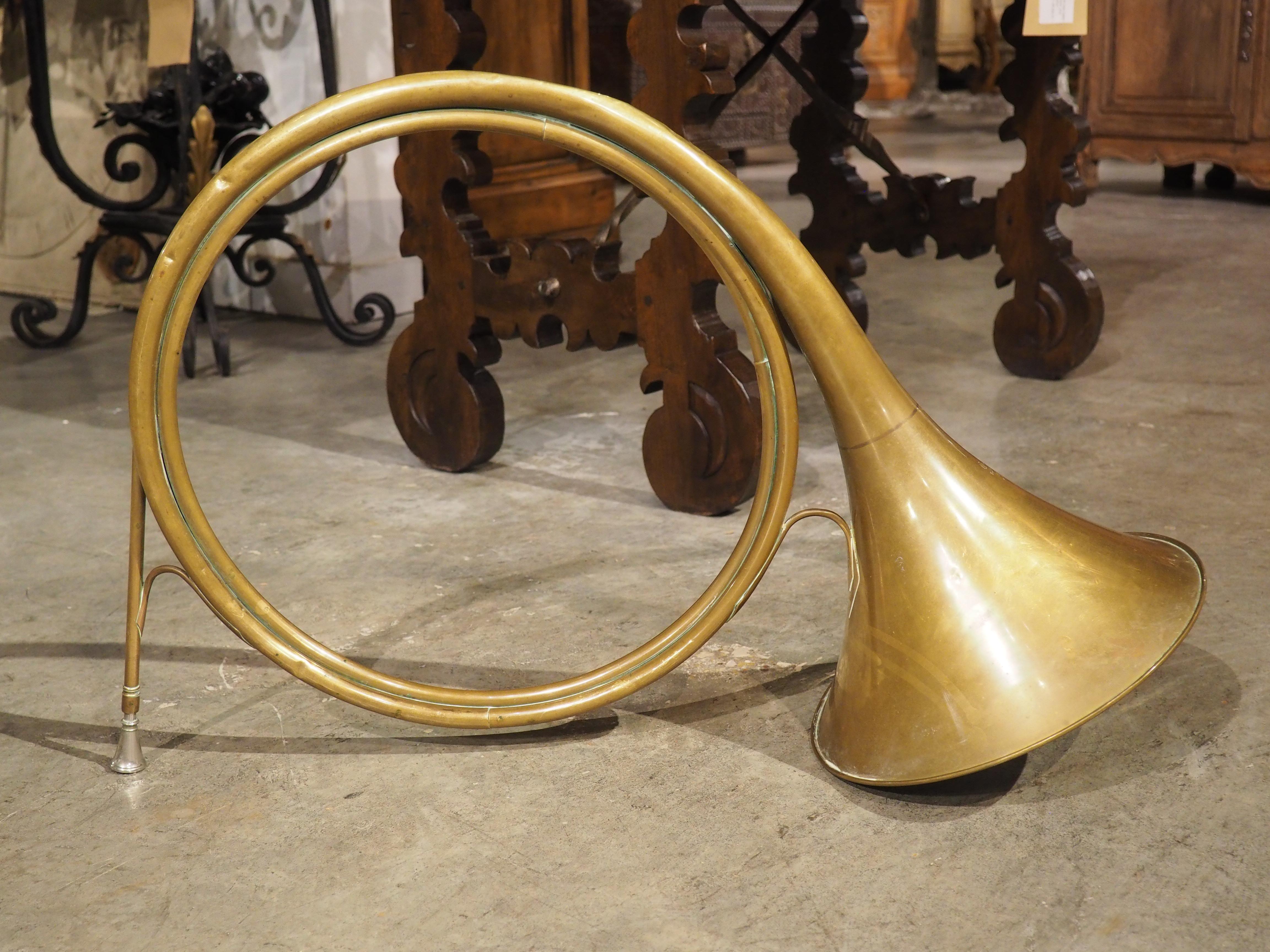 An ancestor of modern orchestral horns, this le cor de chasse, or hunting horn, would have been carried by a member of a fox or stag hunting party known as the huntsman. Unlike orchestral horns, this brass version is valveless, relying on the skill