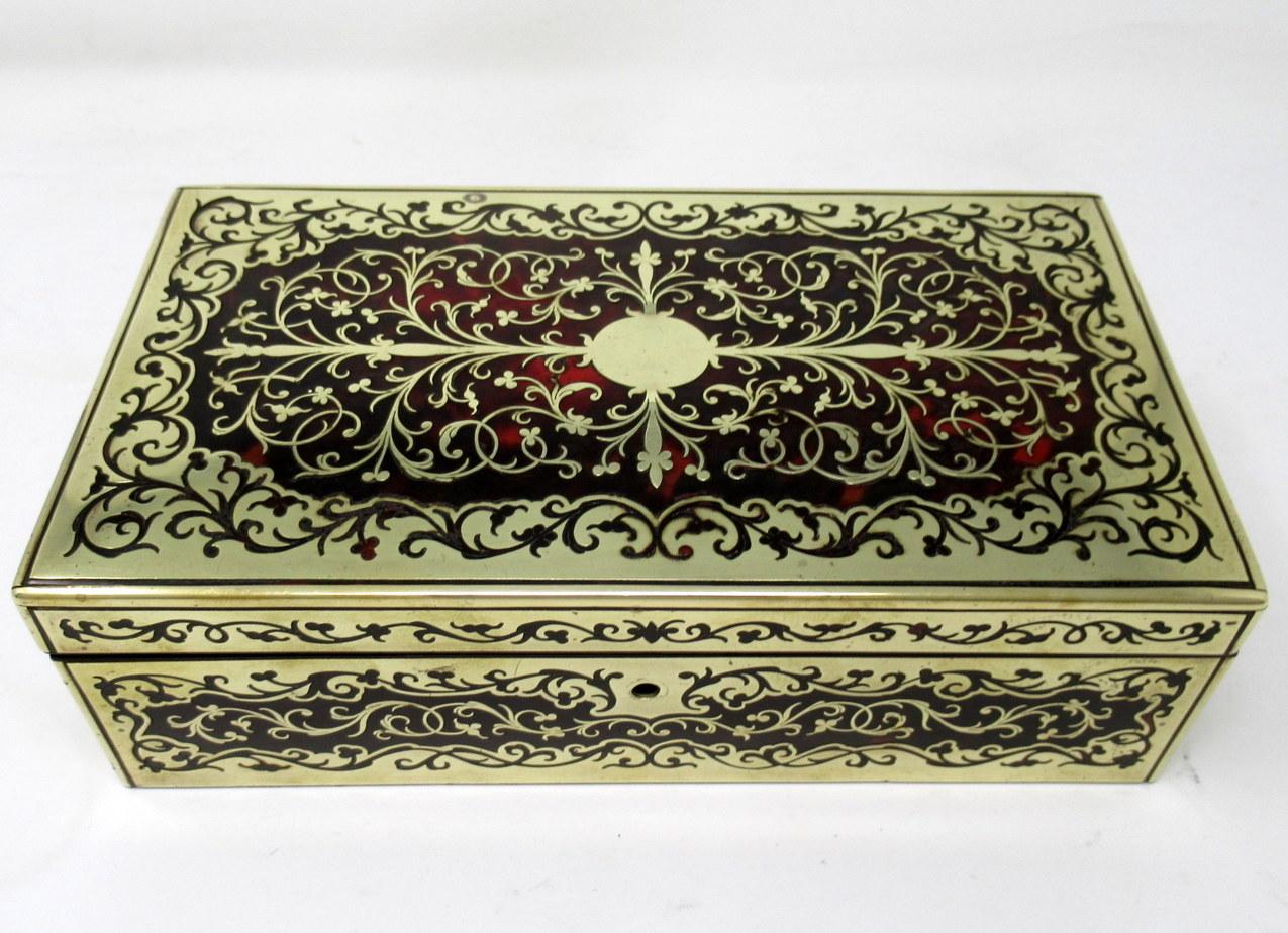 An exceptionally fine quality example of a Lady’s or Gentleman’s Polished Brass, Tortoiseshell and Mahogany carcass Inlaid Boulle Style Jewelllery or Trinket Casket or Table Box made during the last quarter of the Nineteenth Century, of English