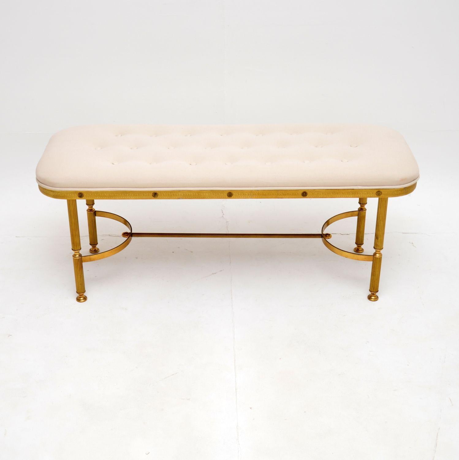 A beautiful and extremely well made antique French brass stool, dating from around the 1930’s.

This is of superb quality, it has a fabulous solid brass base with a wishbone stretcher and fluted legs. The rim around the seat has beautiful embossed