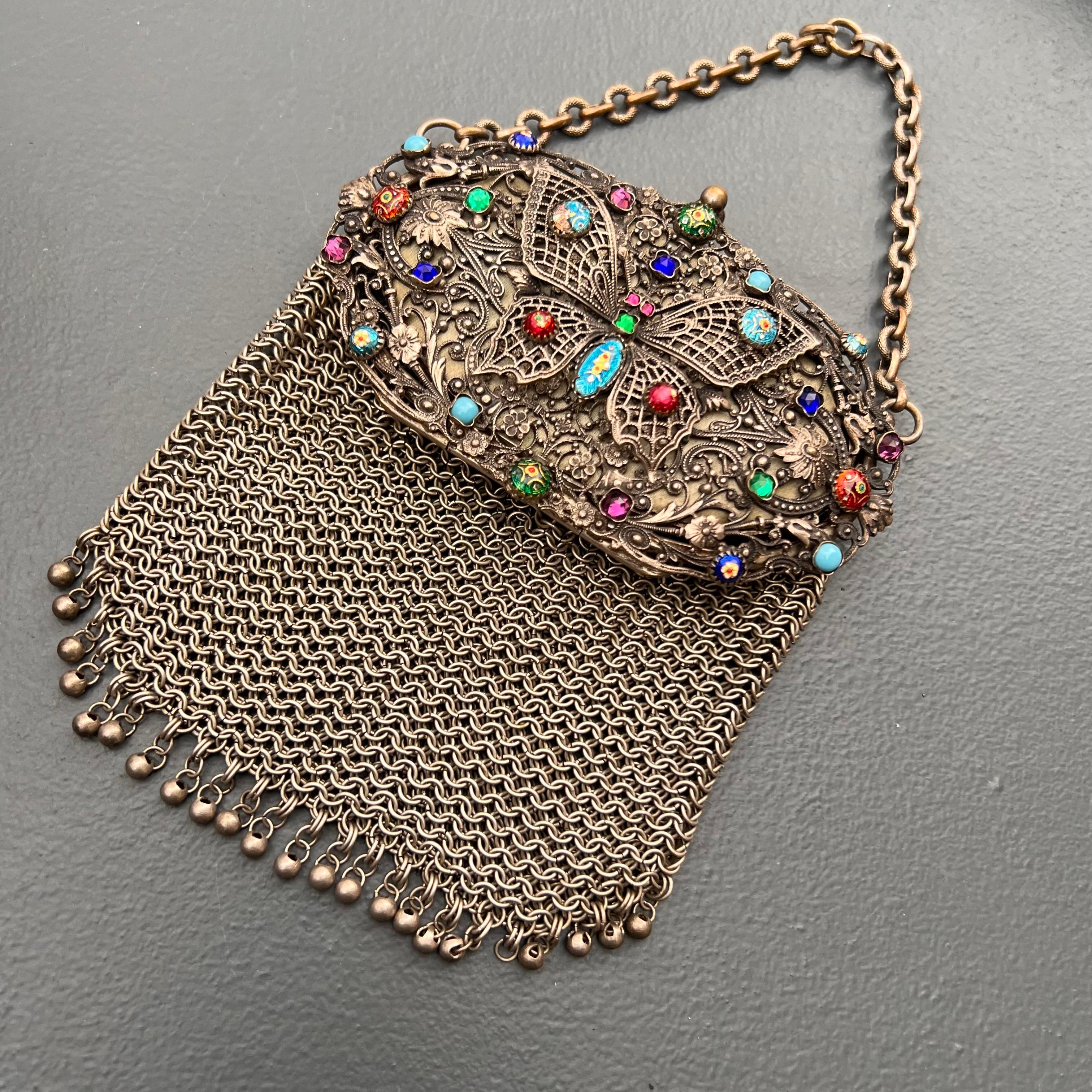 Rare very collectible antique Antique French silver tone with Bresse Enamel Butterfly chatelaine Mesh coin purse featuring  applied filigree panela and enamel cabs on top .
 Bresse enamel or emaux enamel has a distinctive beauty ,it used to be done
