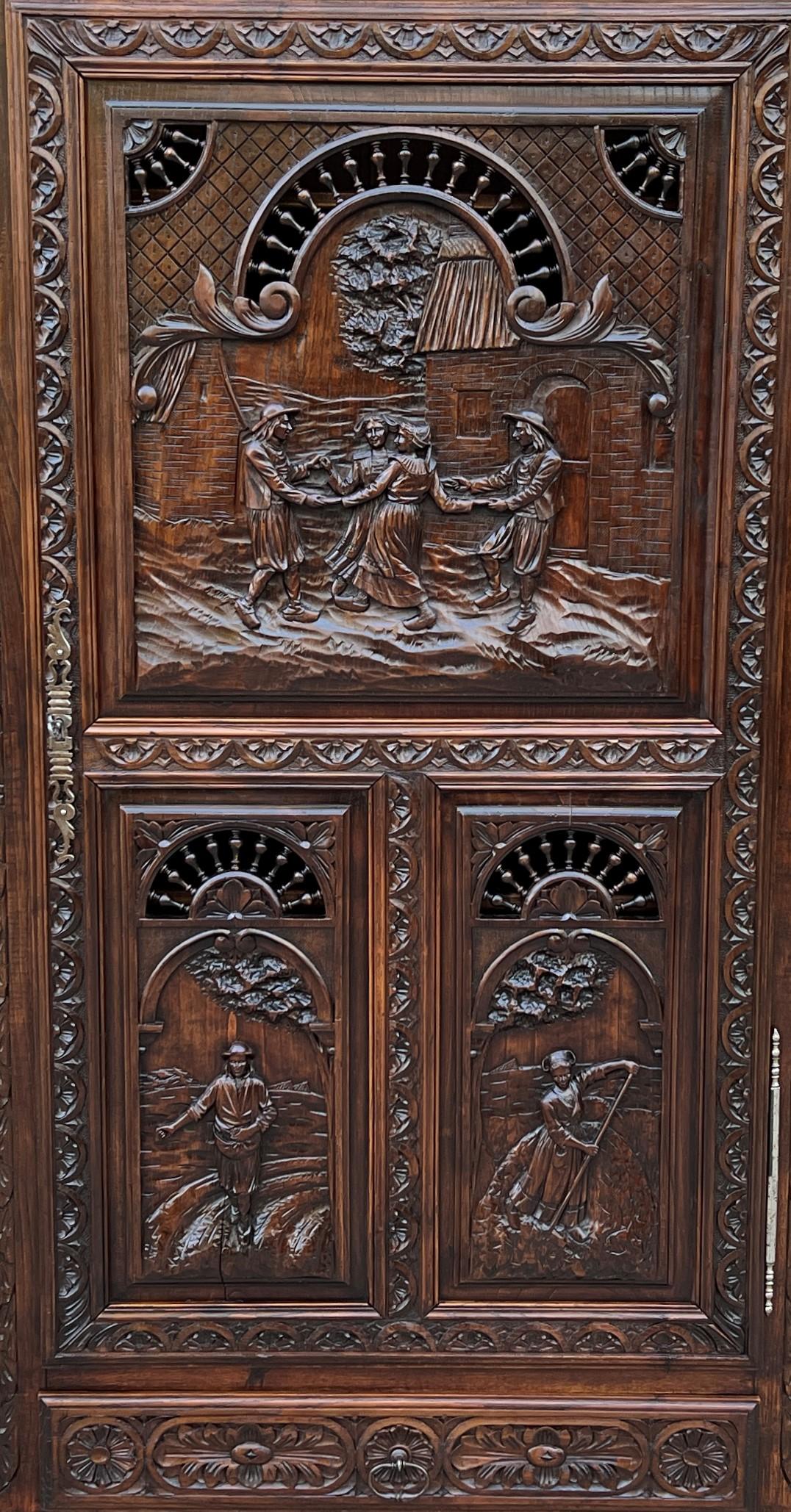 BEAUTIFUL 19th century Antique French Oak BRETON Brittany Cabinet, Armoire, Wardrobe, or Bonnetiere with Lower Drawer, Key, and 4 Interior Shelves.
~~c. 1880s

Charming carved oak cabinet or 