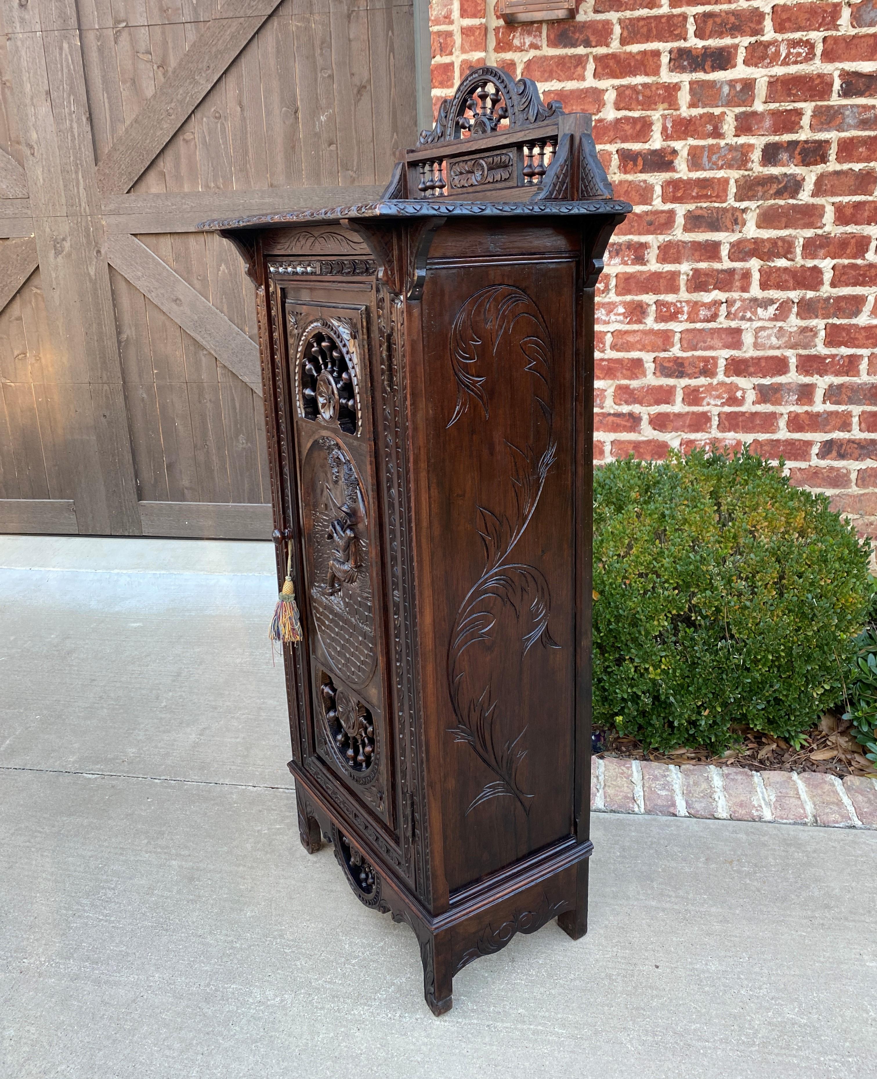 Antique French Breton Cabinet Bonnetiere Cupboard Carved Dark Oak Brittany 19thC In Good Condition In Tyler, TX