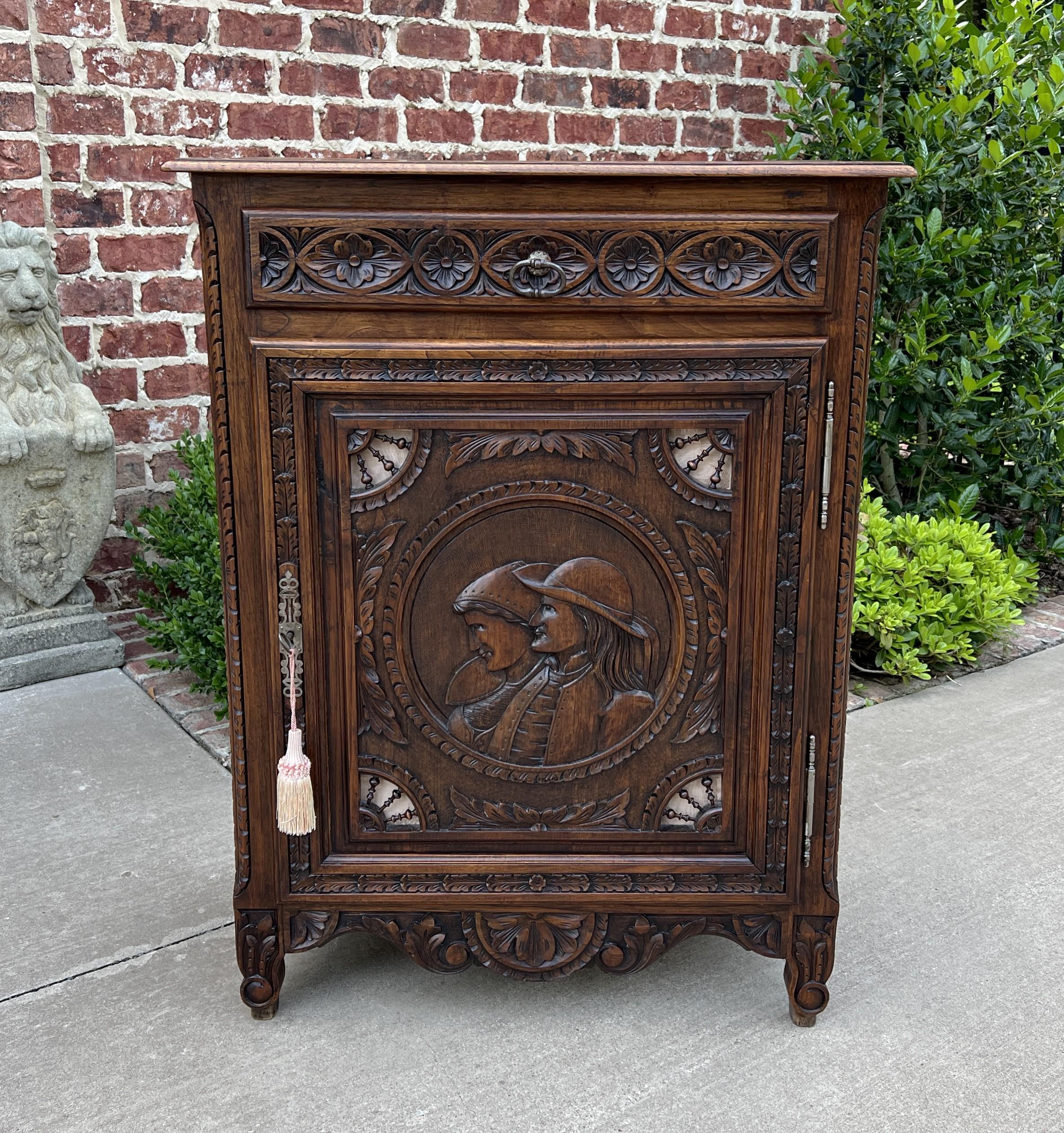 Beautifully Carved Antique French Oak Breton Jam Cabinet with Drawer~~c. 1890s 

 Highly requested classic French Breton design~~Breton (sometimes known as Brittany) furniture originated in late 19th century France in a region to the west of