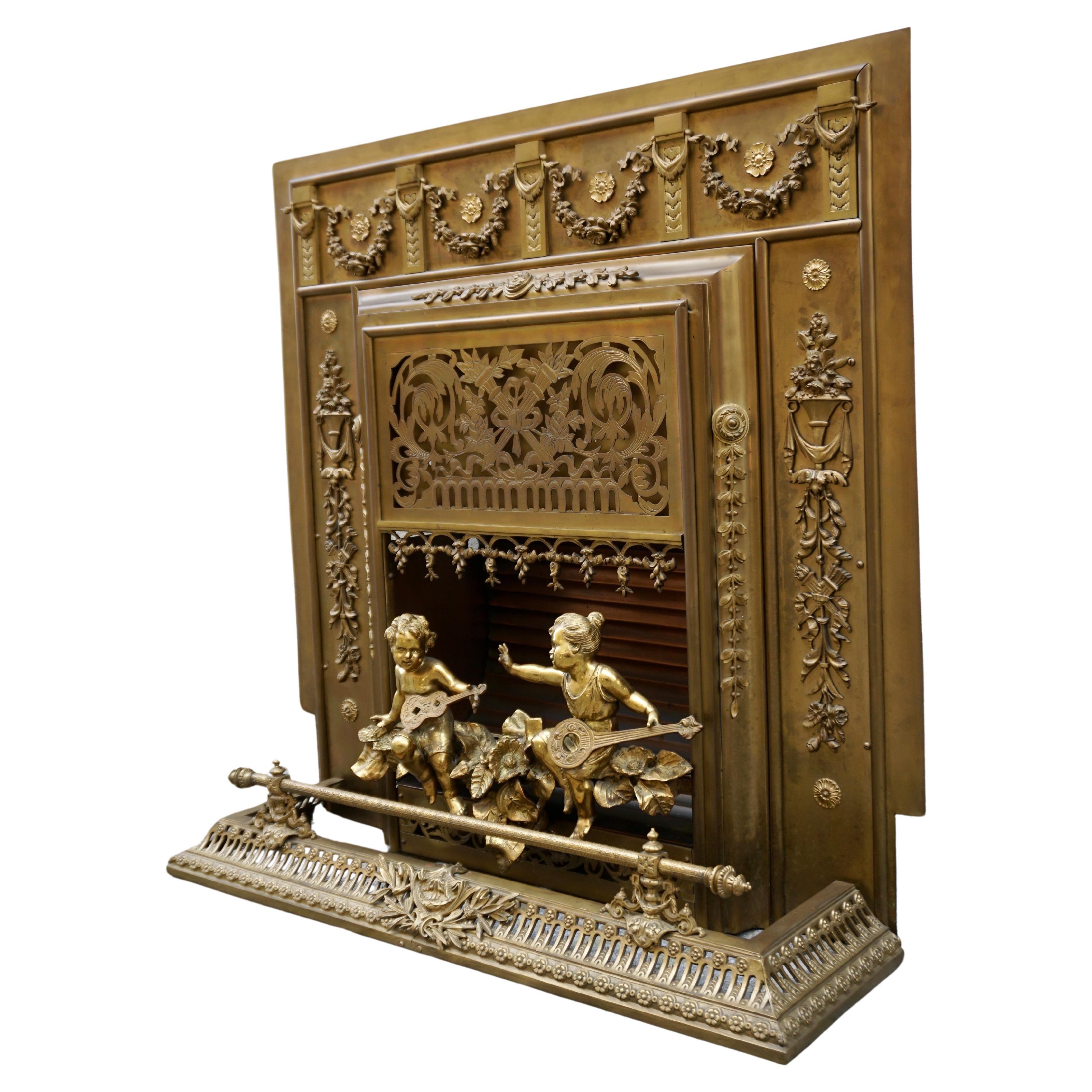 Cheminée française ancienne en bronze et laiton avec ange et garde-feu