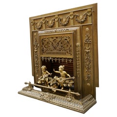 Antique French Bronze and Brass Fire Surround with Angels and Fender