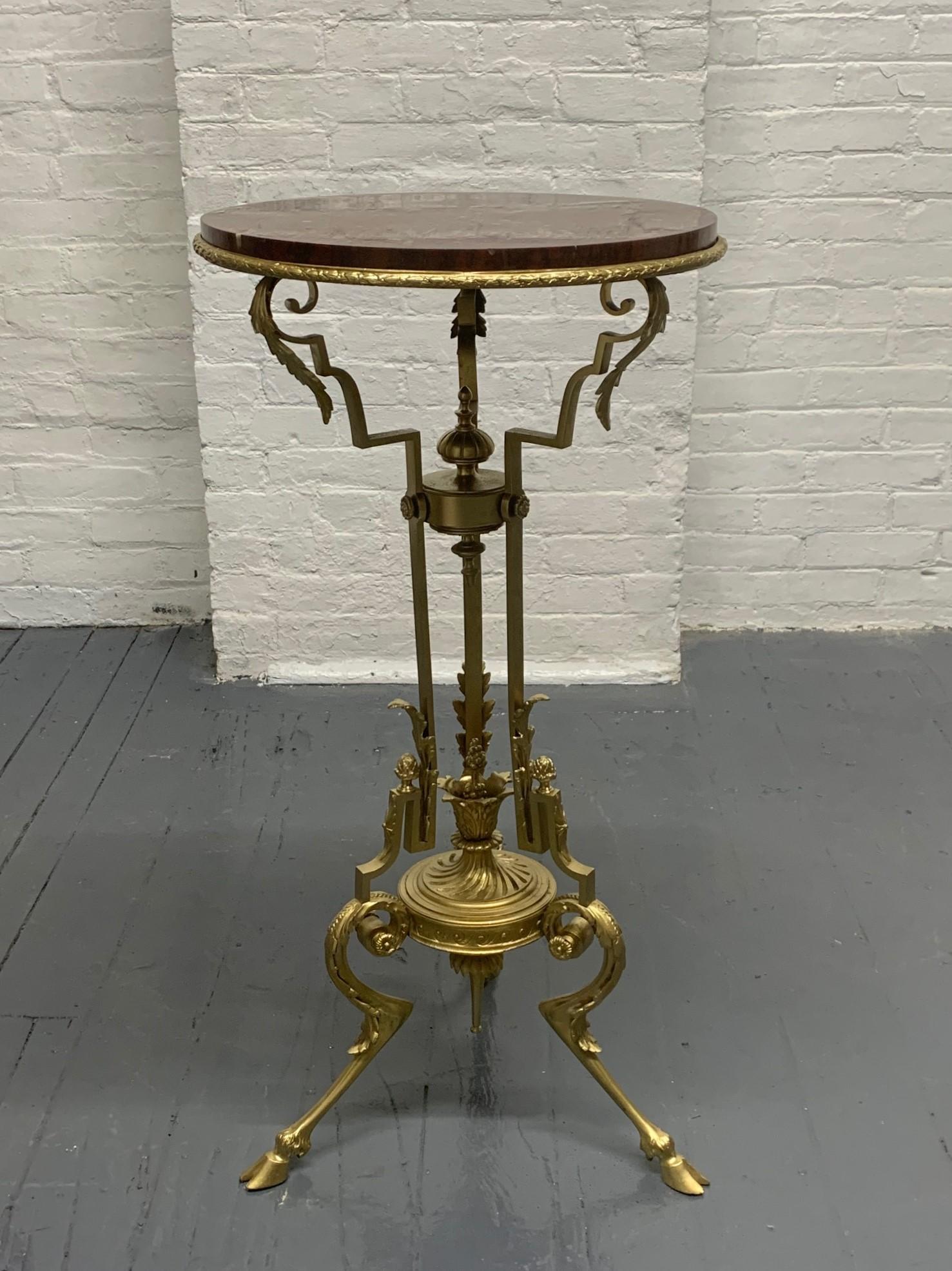 1920s French bronze and marble pedestal. Pedestal has hoof feet, a nice burgundy marble top with a decorative and ornate bronze frame.