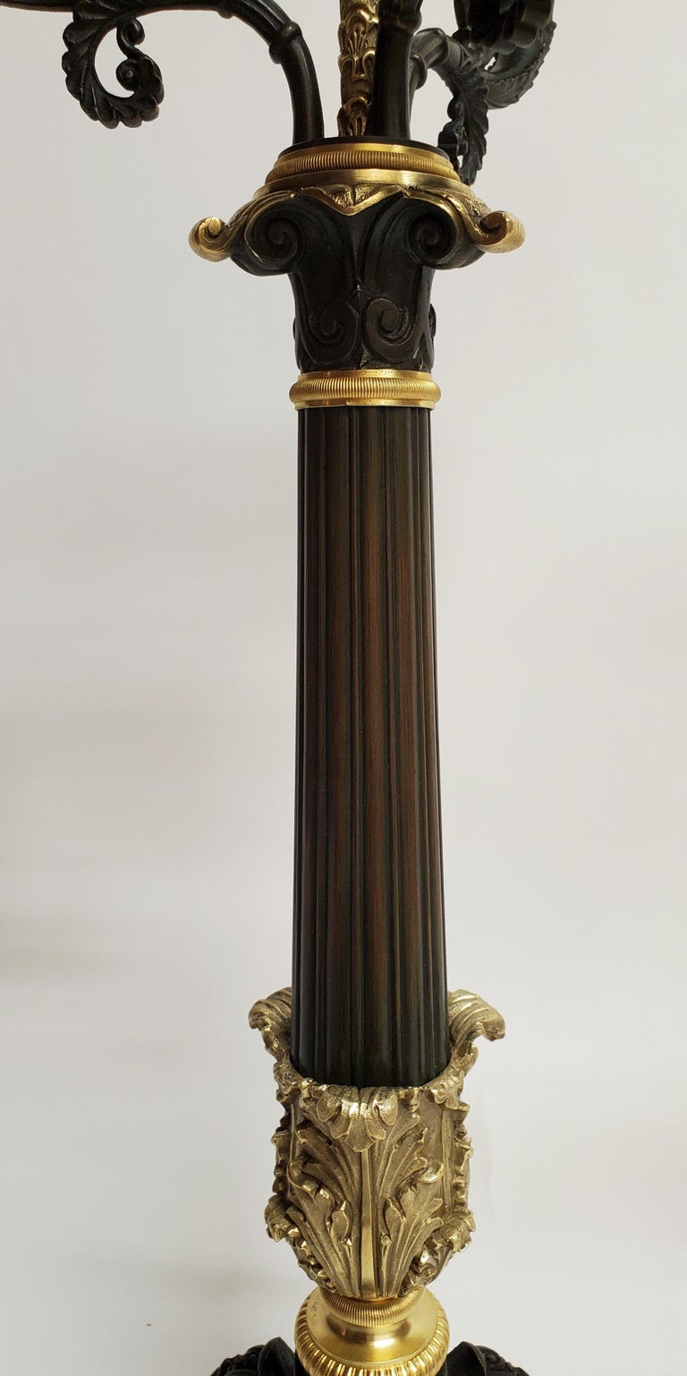 Past auction: A pair of large French Louis Philippe ormolu candlesticks  circa 1830-1840