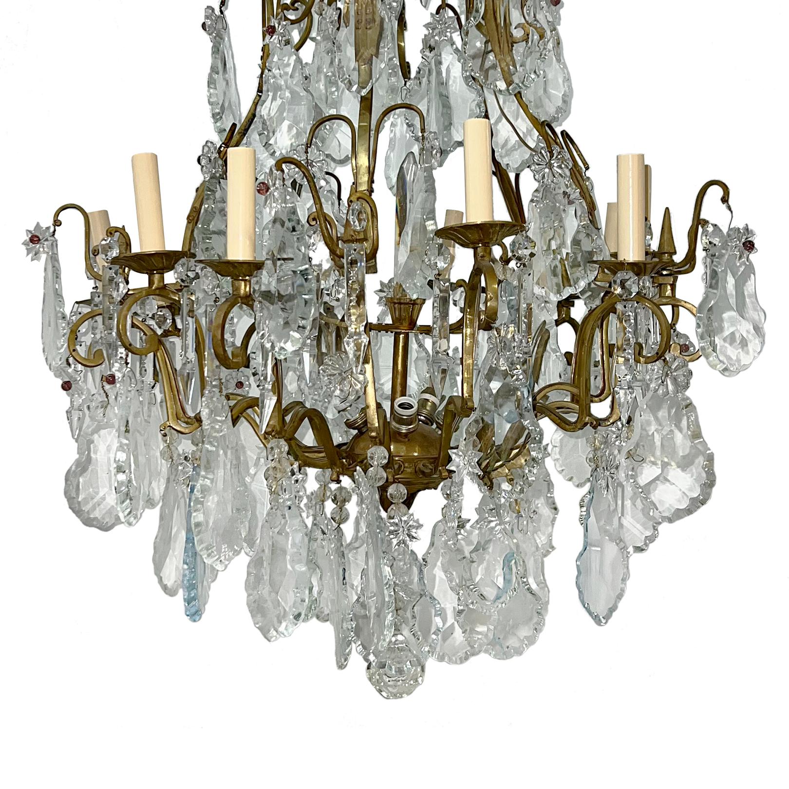 A circa 1900's French chandelier with original patina, 10 lights.

Measurements:
Min drop: 44
