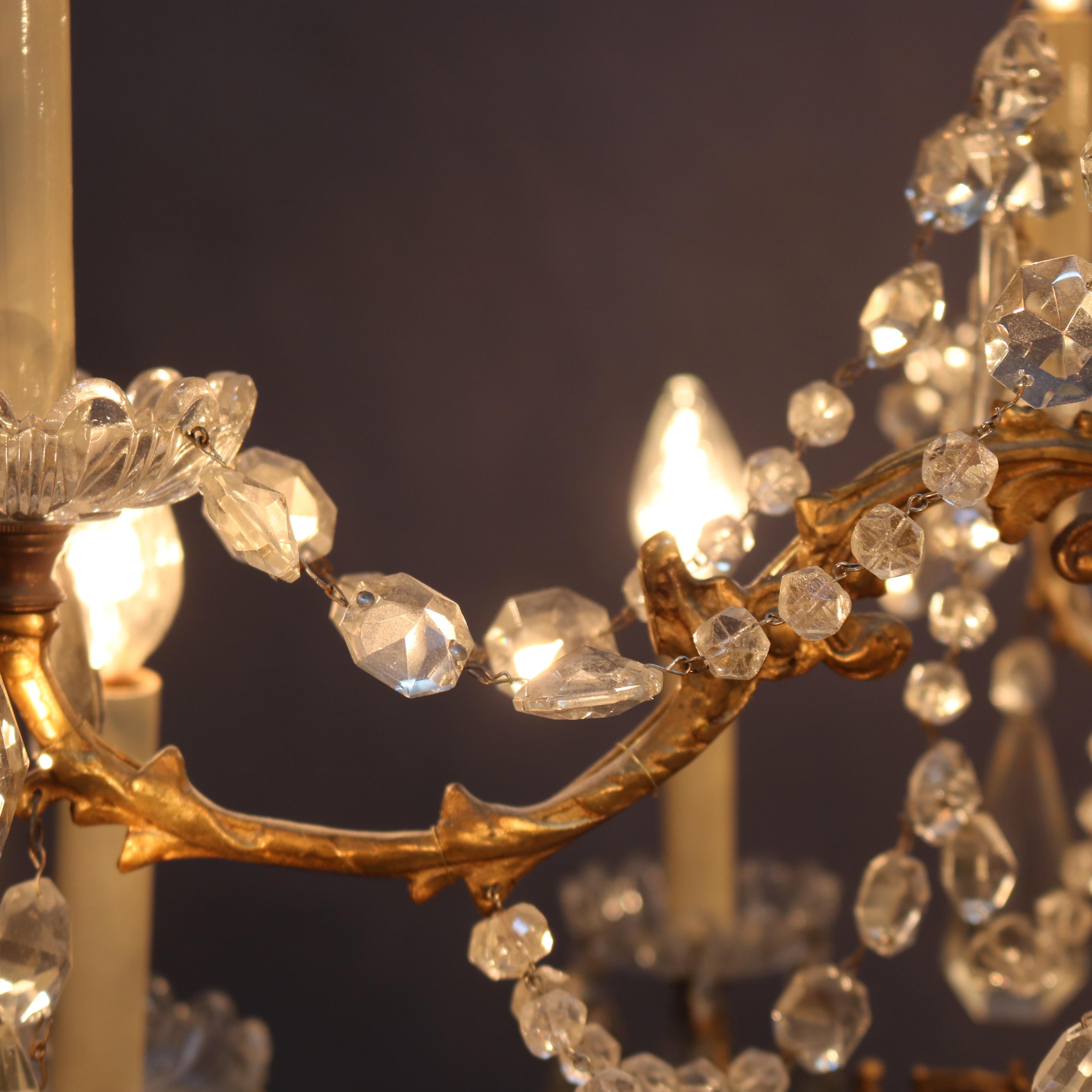 Antique French Bronze and Crystal Twelve-Light Chandelier, circa 1920 8